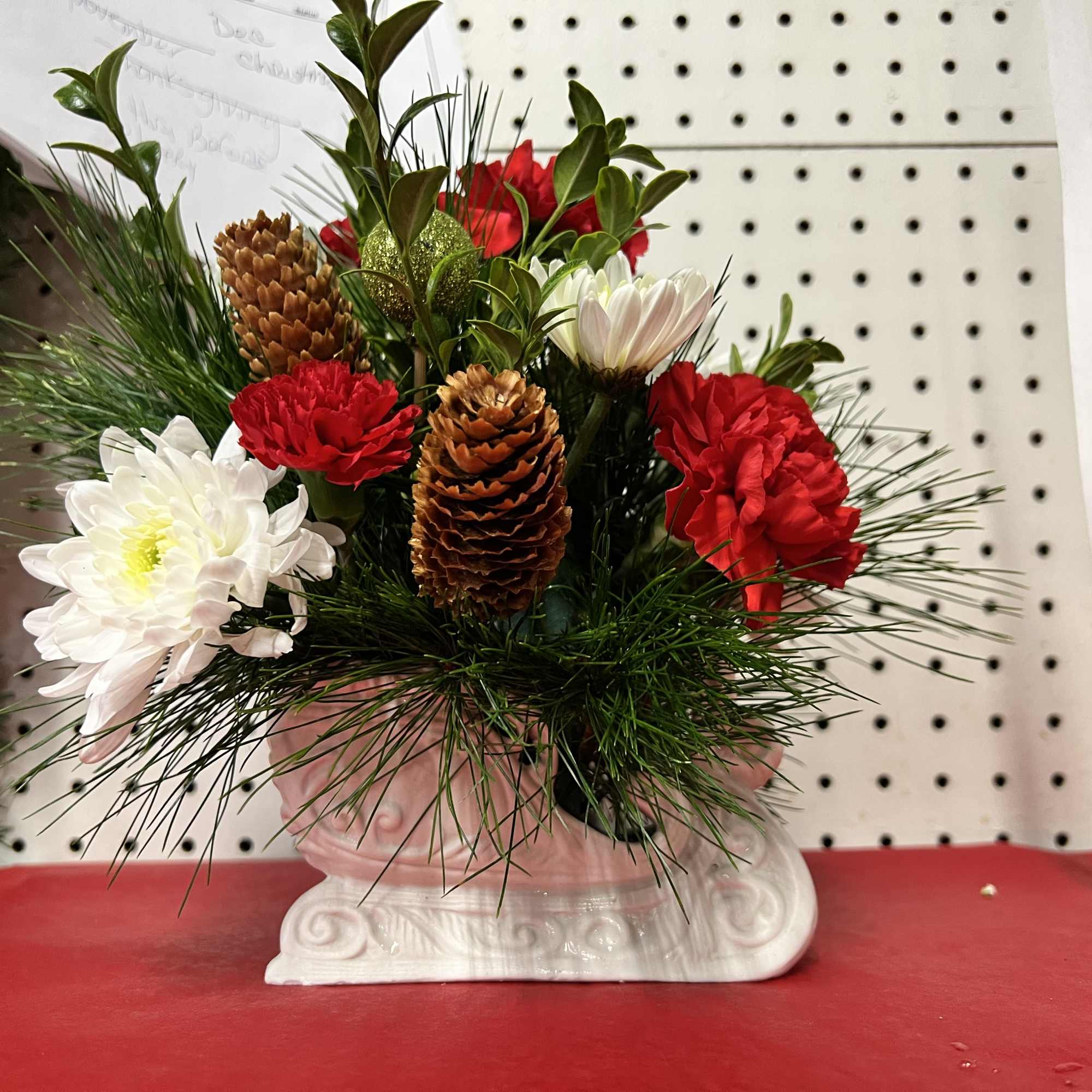 White porcelain  slay with fresh greenery and pine, with fresh cut