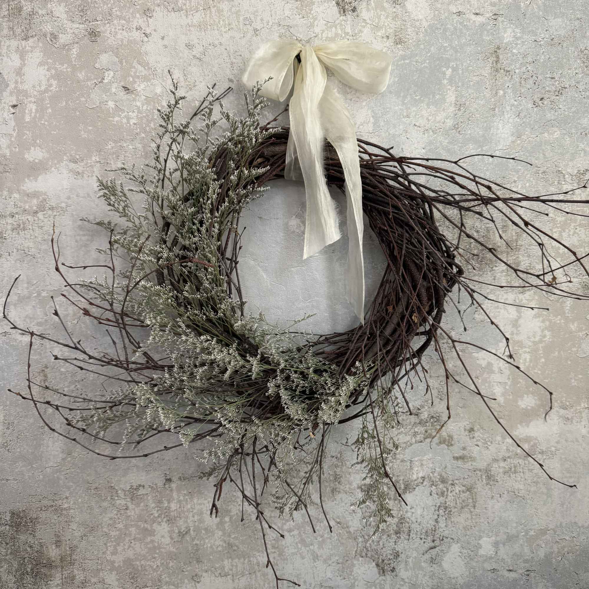 Our custom wreaths are made in a wild, organic style that feels