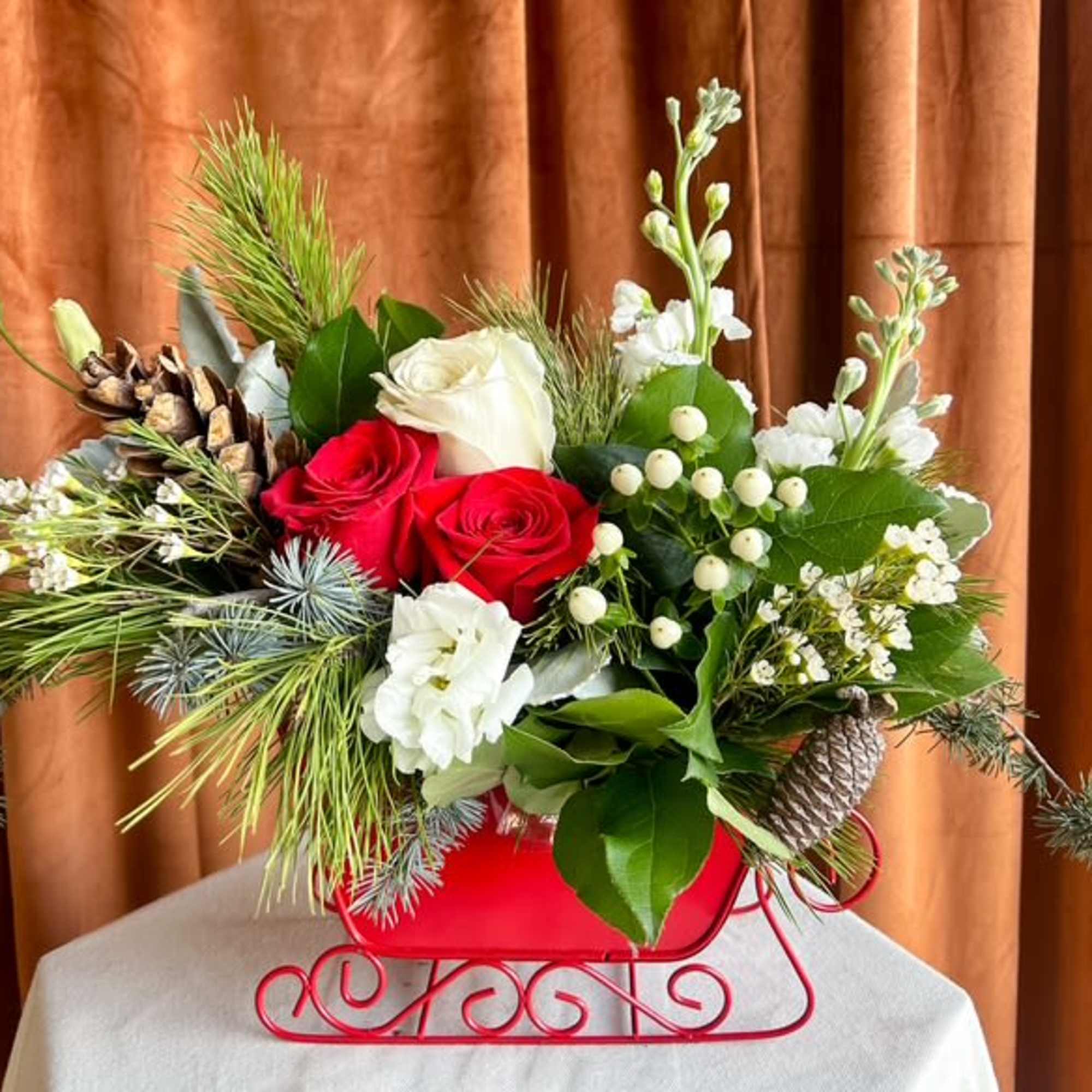 Celebrate the magic of the season with this charming winter centerpiece designed