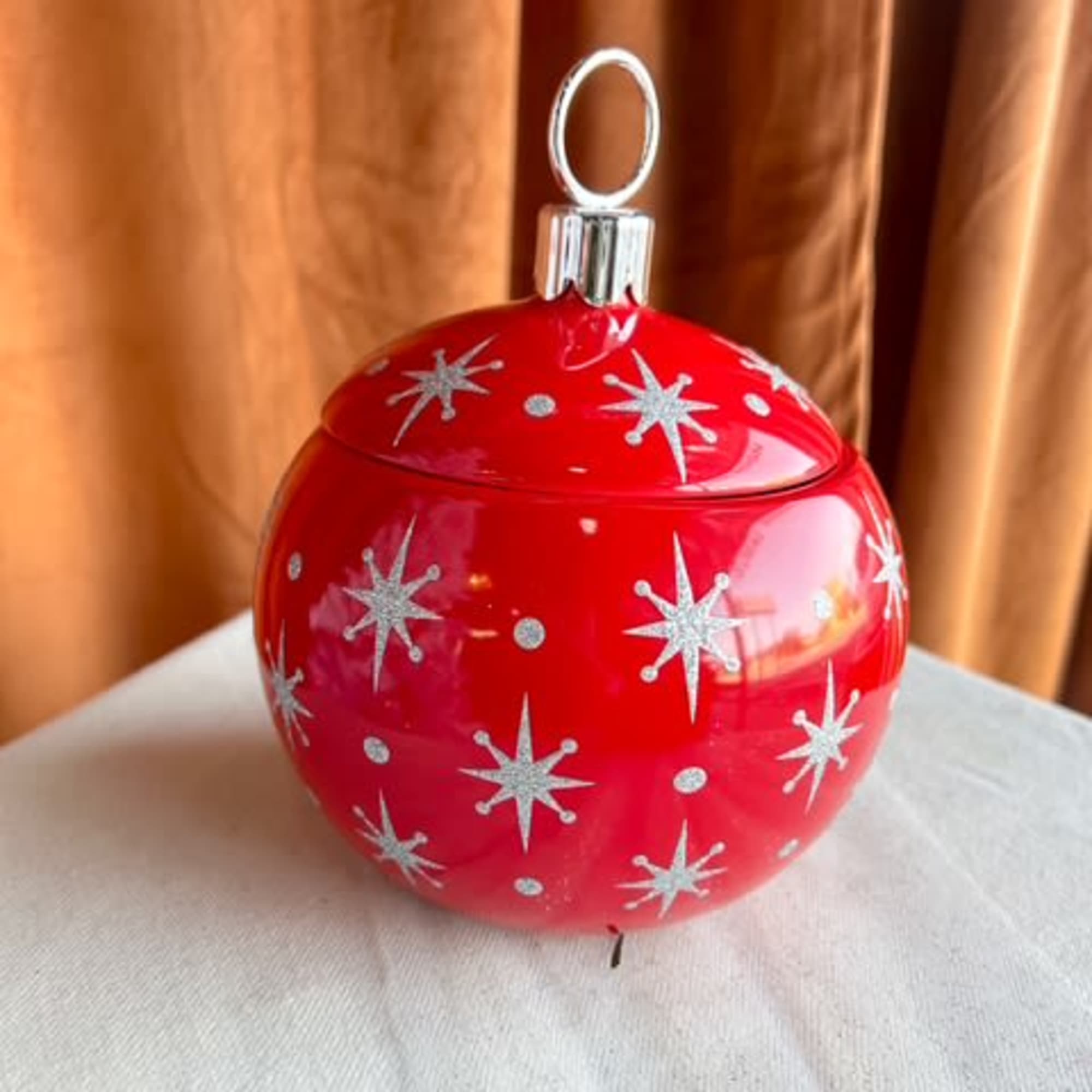 Add a joyful pop of Christmas cheer to any space with this