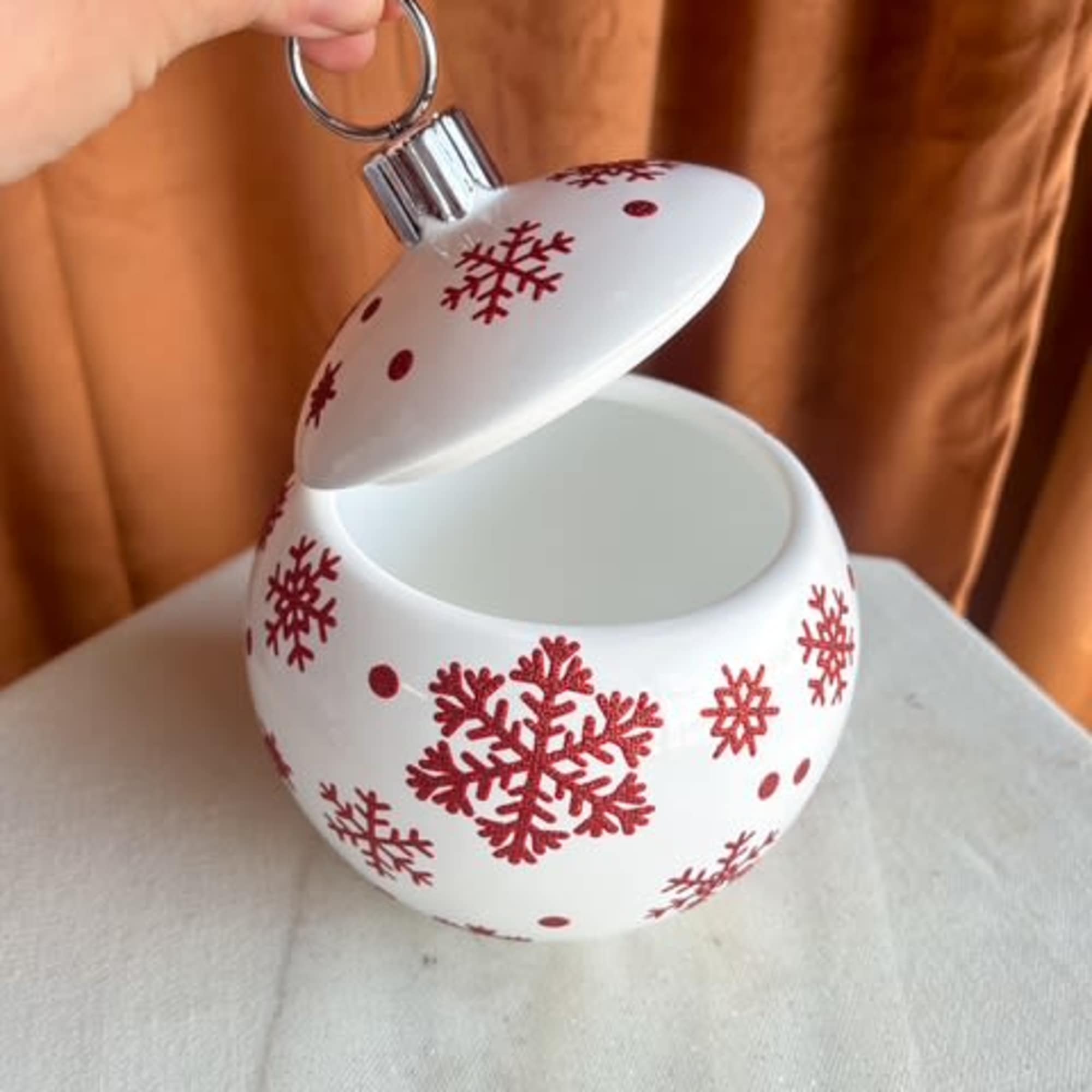 Add a joyful pop of Christmas cheer to any space with this