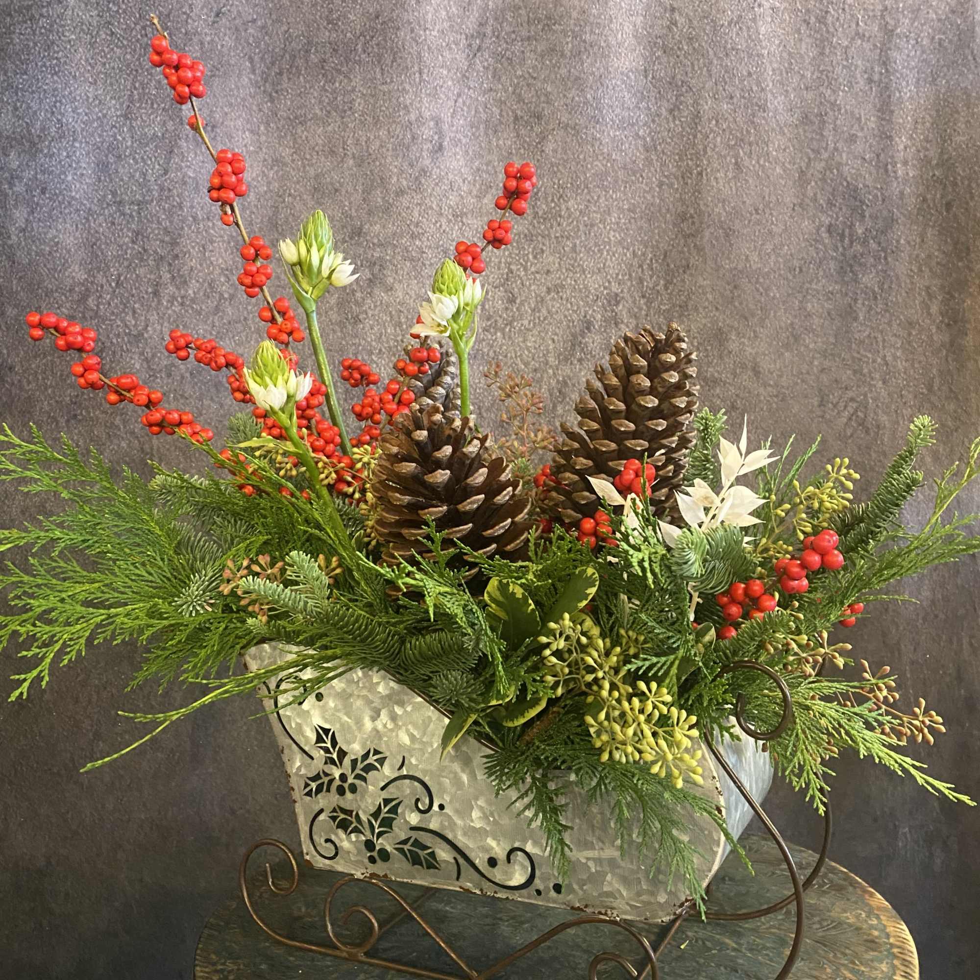 Celebrate the Winter months with an evergreen &quot;Sleigh Ride&quot;, decorated with mums