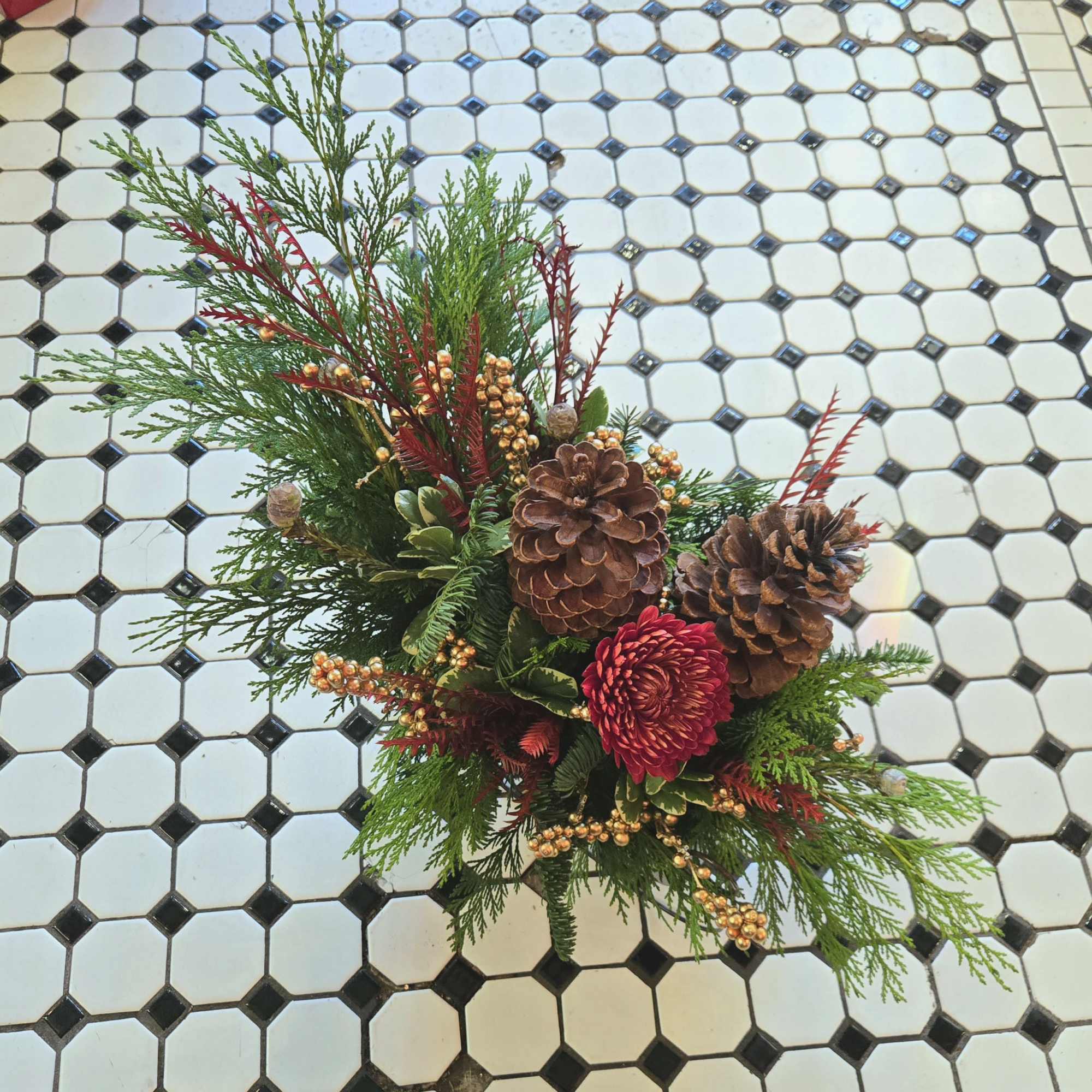 Celebrate the Winter months with an evergreen &quot;Sleigh Ride&quot;, decorated with mums