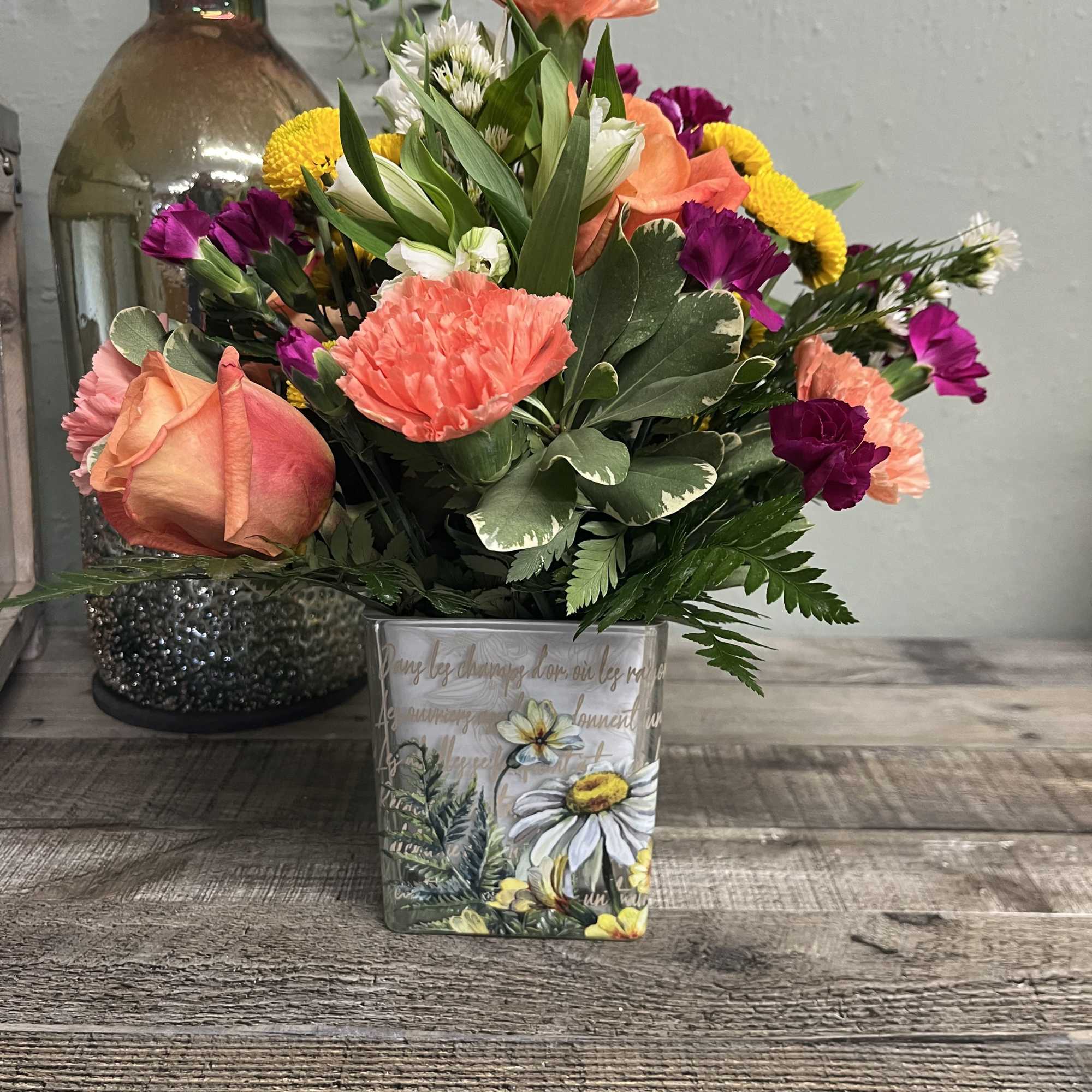 Like a bee dancing through a hidden garden, this enchanting bouquet of