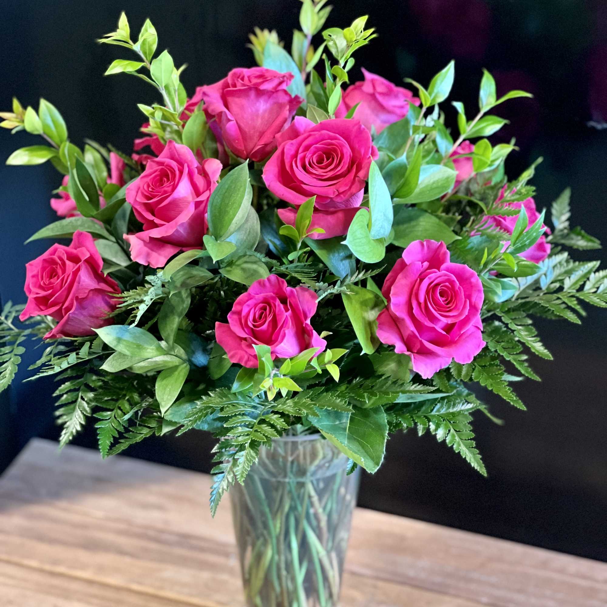 Show someone how much you care with a dozen hot pink roses!