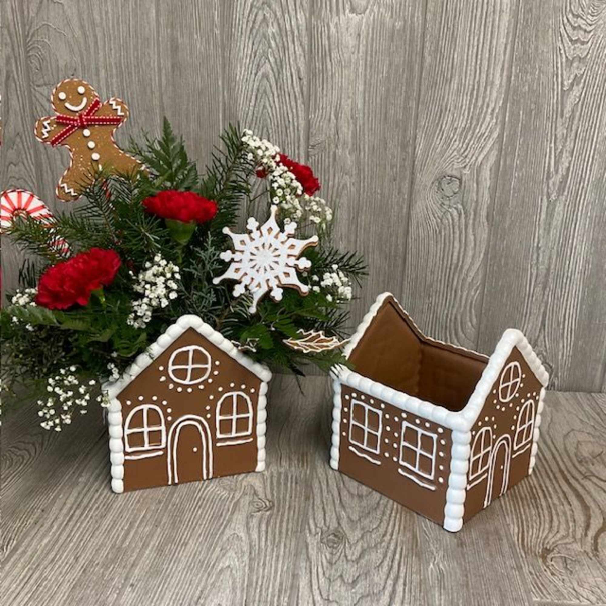 Ceramic keepsake Gingerbread house filled with long lasting Christmas greenery and festive