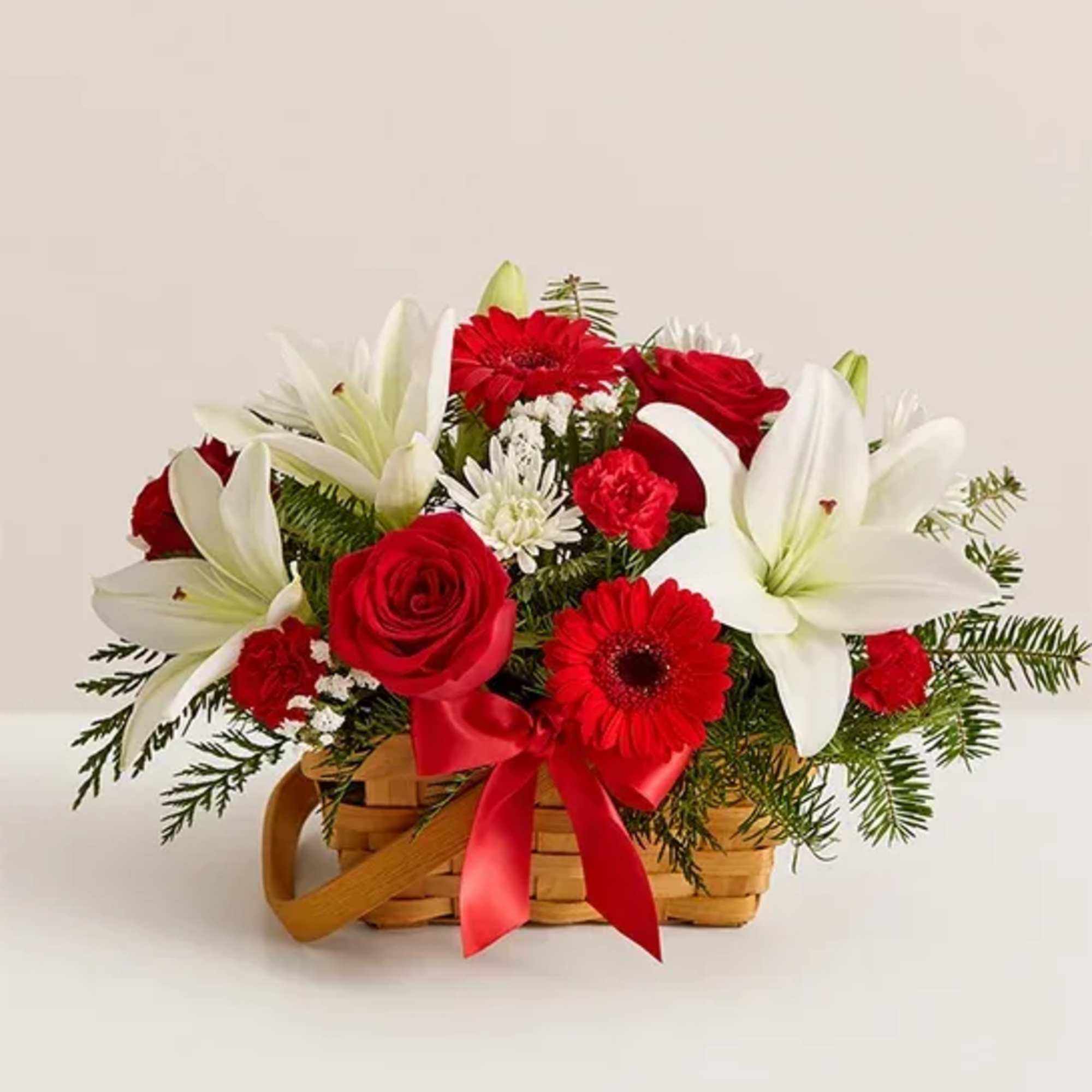 Spread holiday cheer with our inviting basket of blooms. Capturing the natural