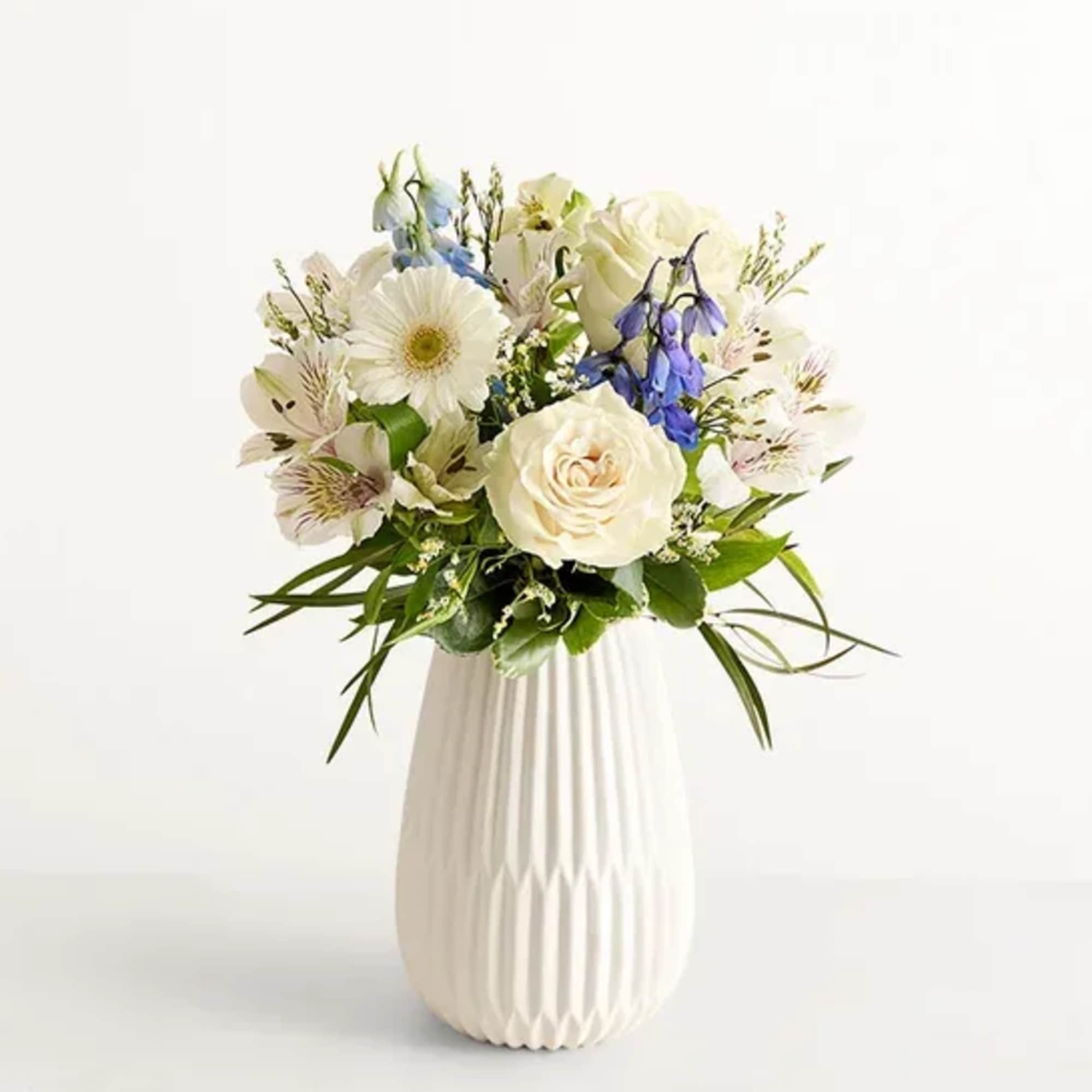 EXCLUSIVE Send the calming beauty of winter in a bouquet. Hand designed