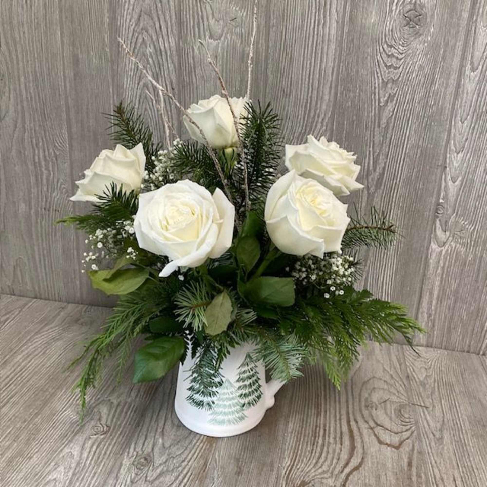 White winter roses in a keepsake pitcher.  