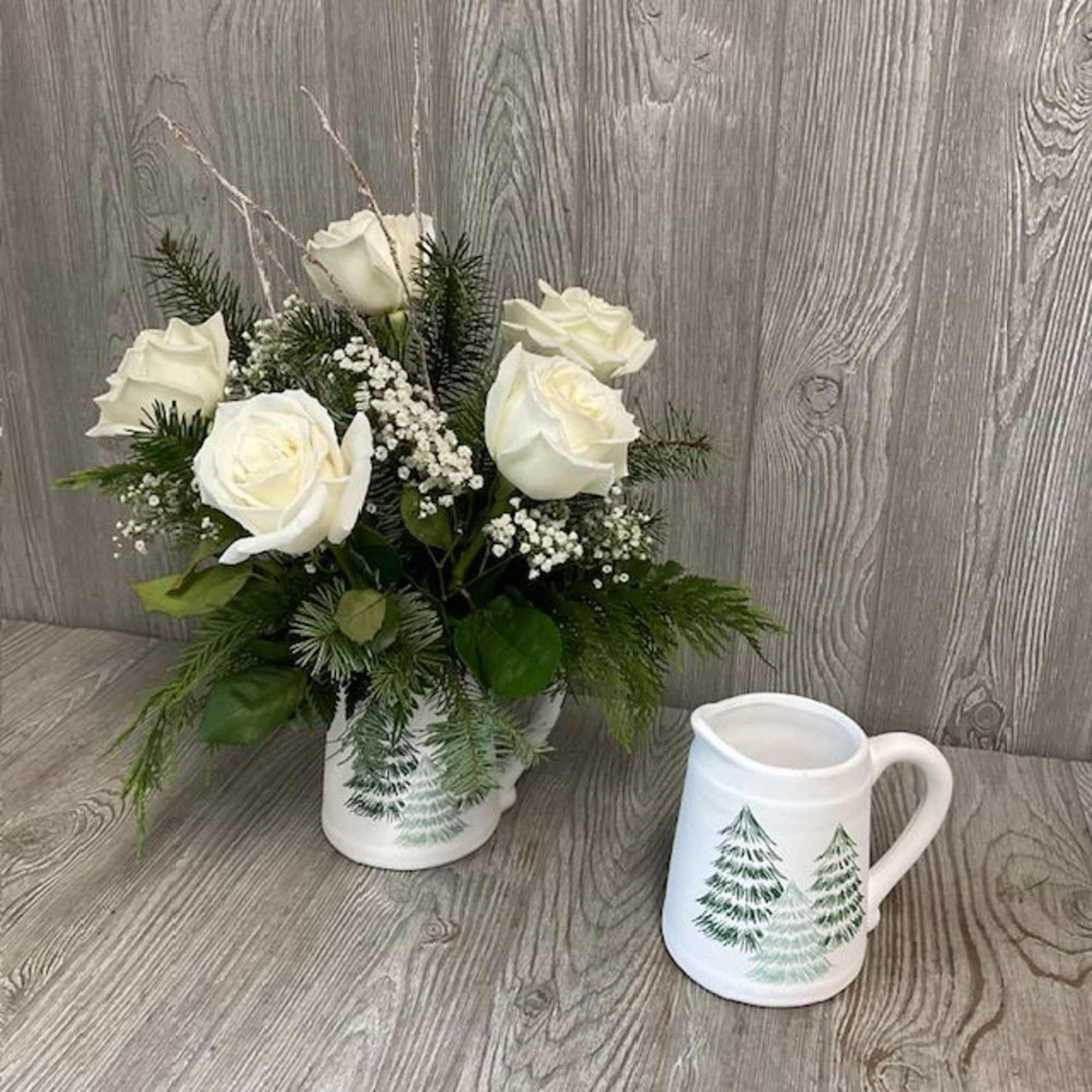 White winter roses in a keepsake pitcher.  