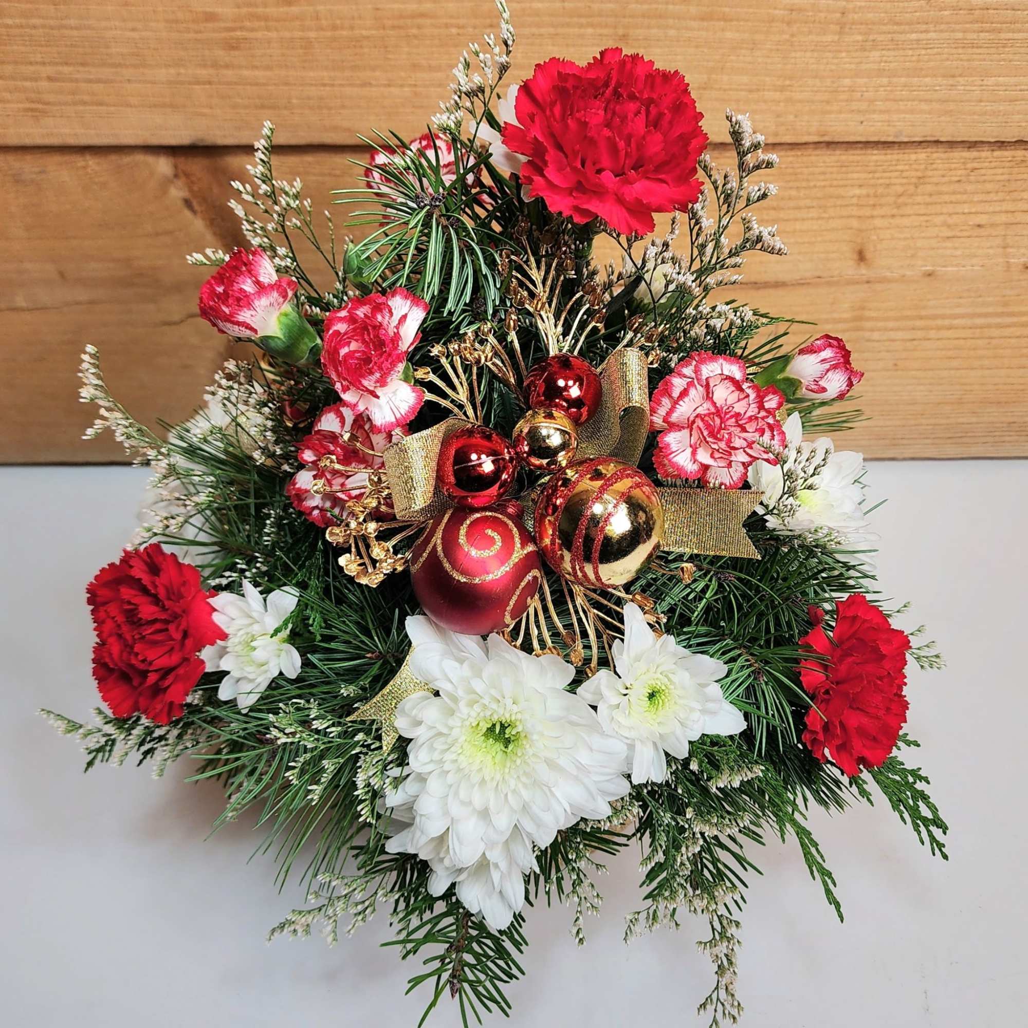 Santa&#039;s delivering a Holiday Haul this year, floral style! This arrangement comes