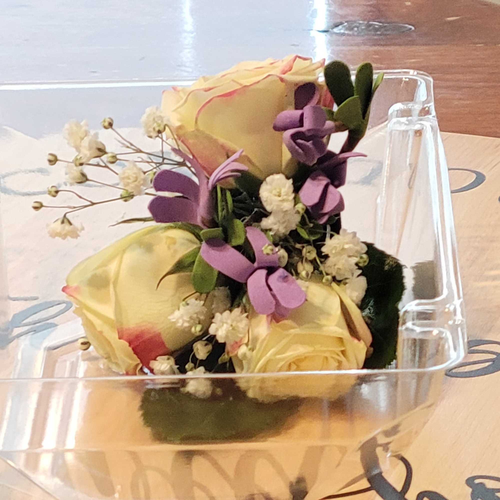 Choose the color of ribbon to go with the roses.  Pictured