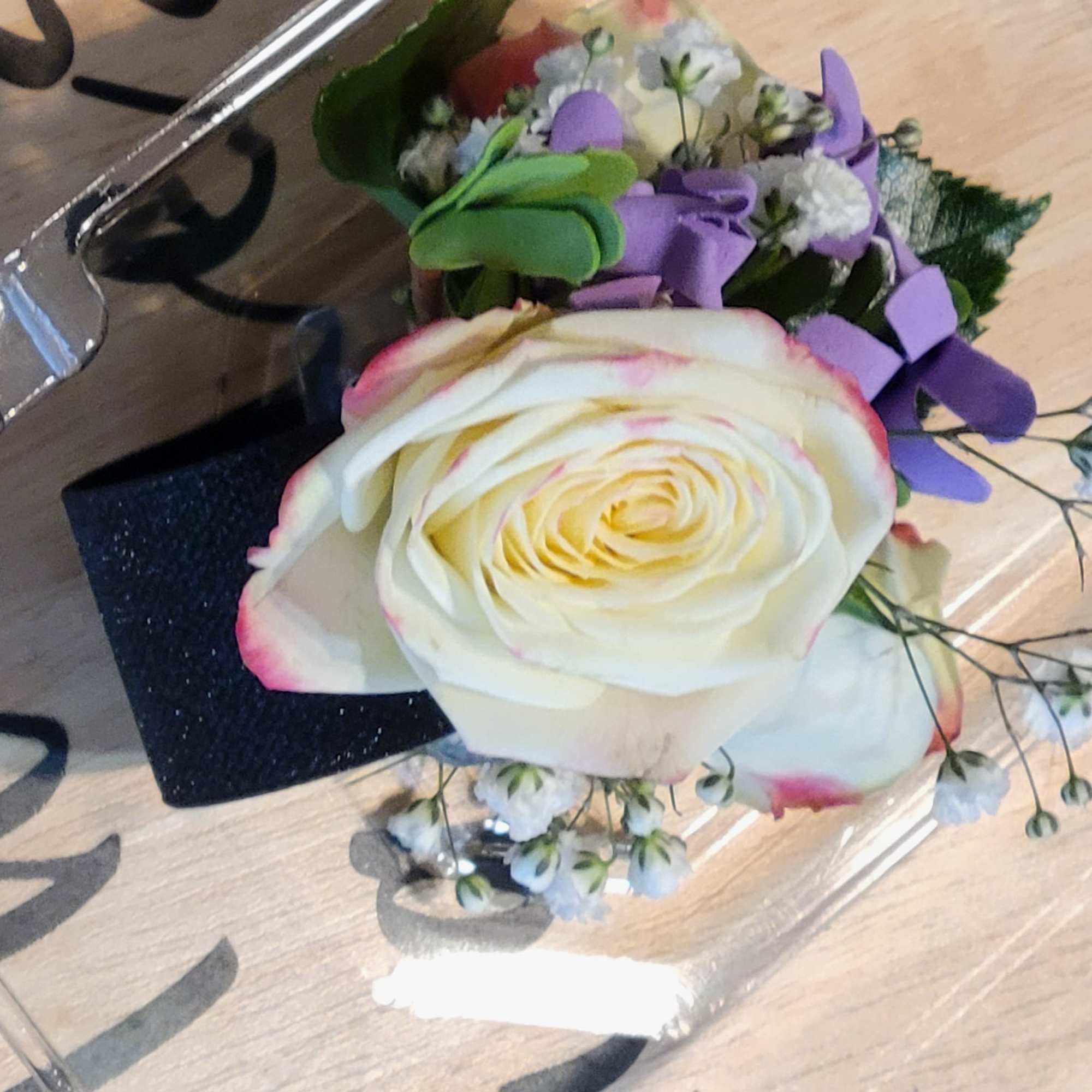 Choose the color of ribbon to go with the roses.  Pictured