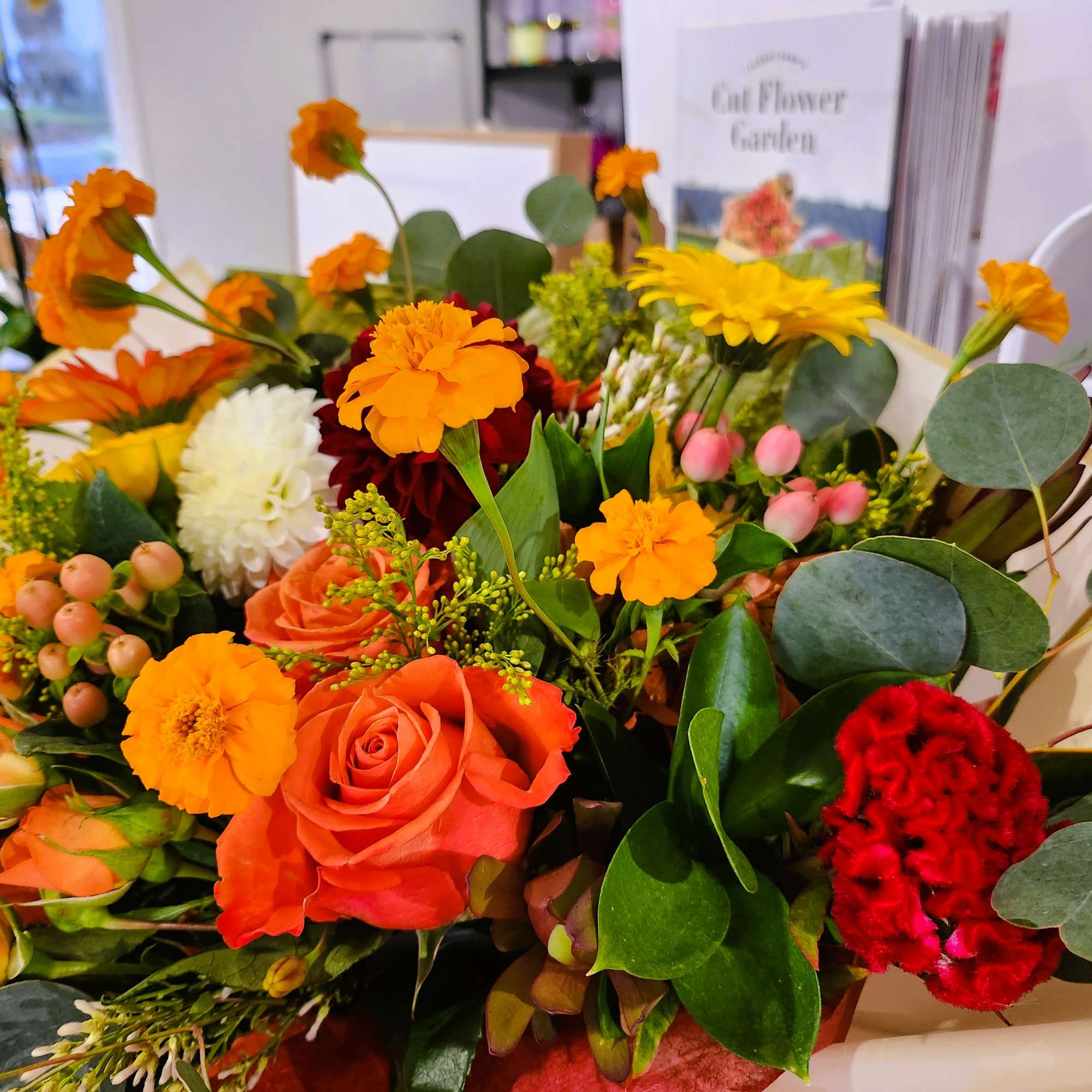 Orange, yellow, Deep burgundy color mix arrangement hand bouquet
