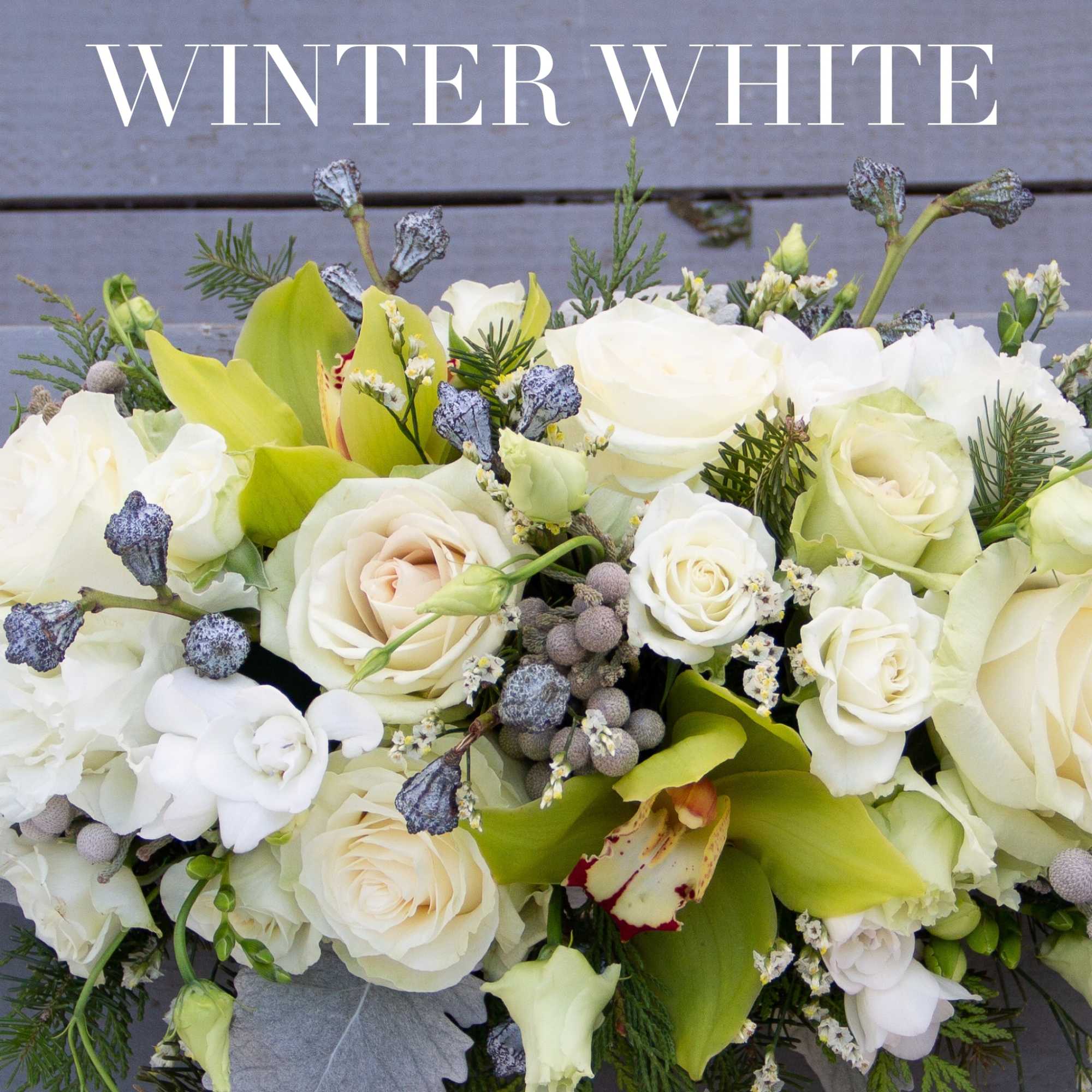 A low sitting centerpieces approximately 20-24&quot; finished length full of lush winters