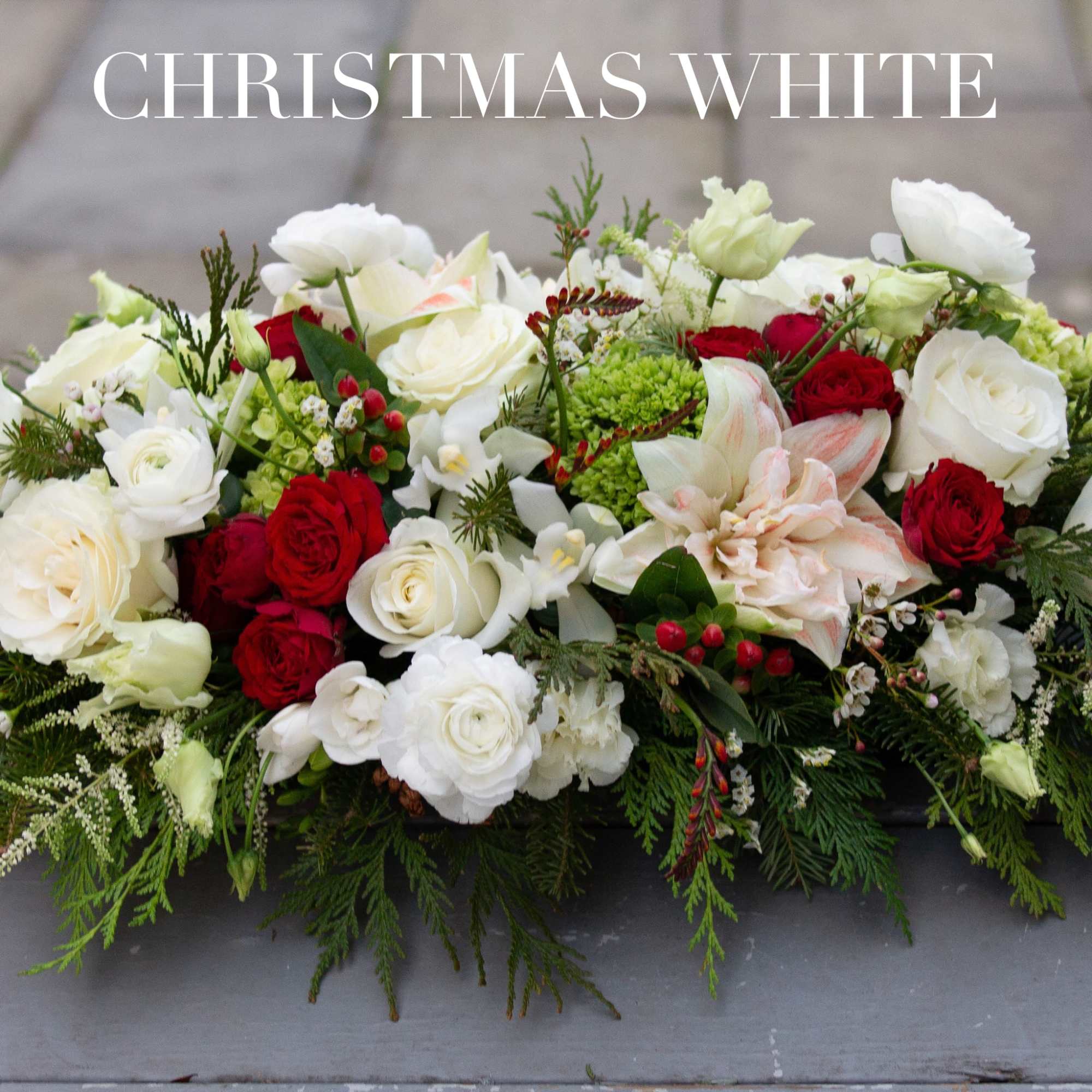 A low sitting centerpieces approximately 20-24&quot; finished length full of lush winters