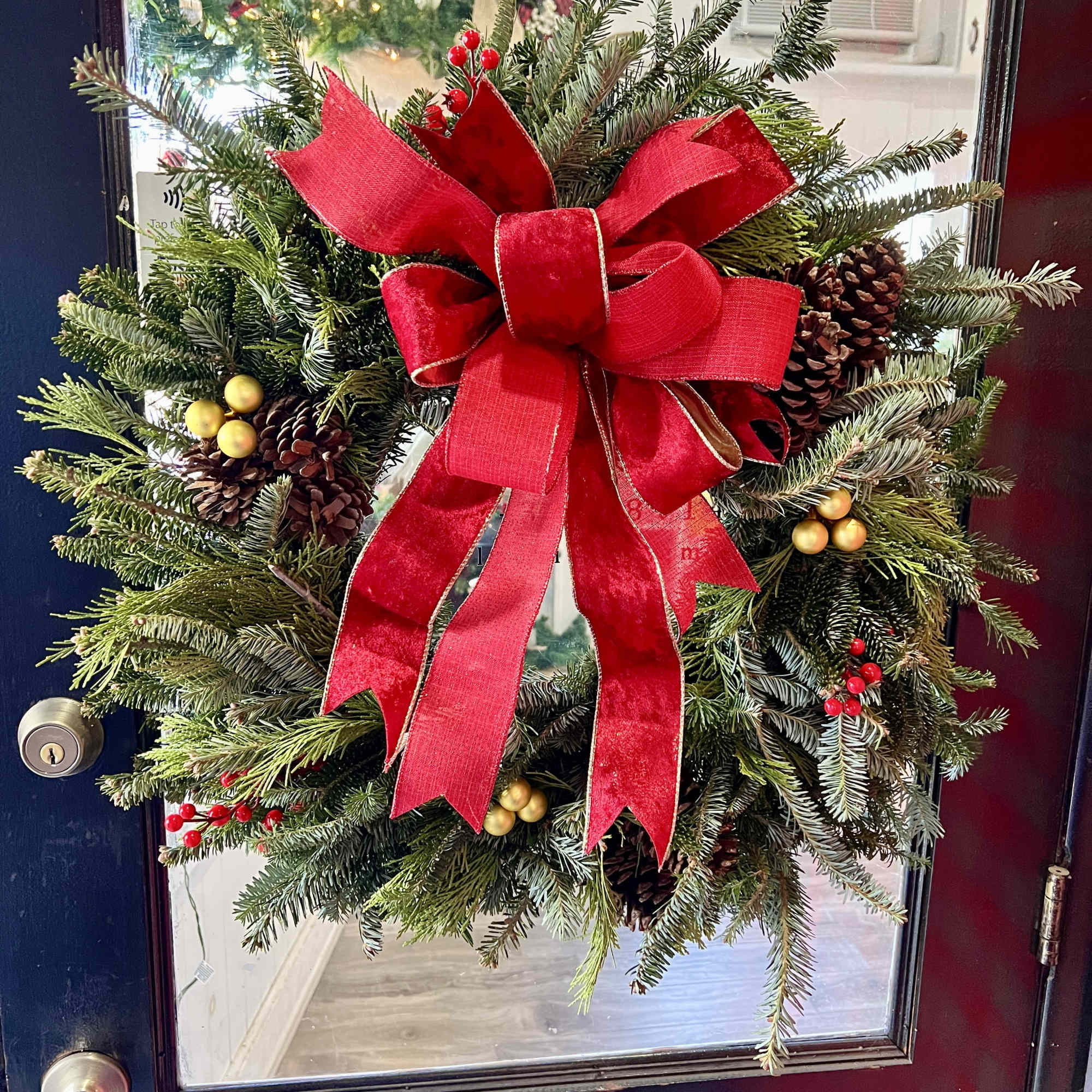 This stunning festive wreath is what your front door needs. 