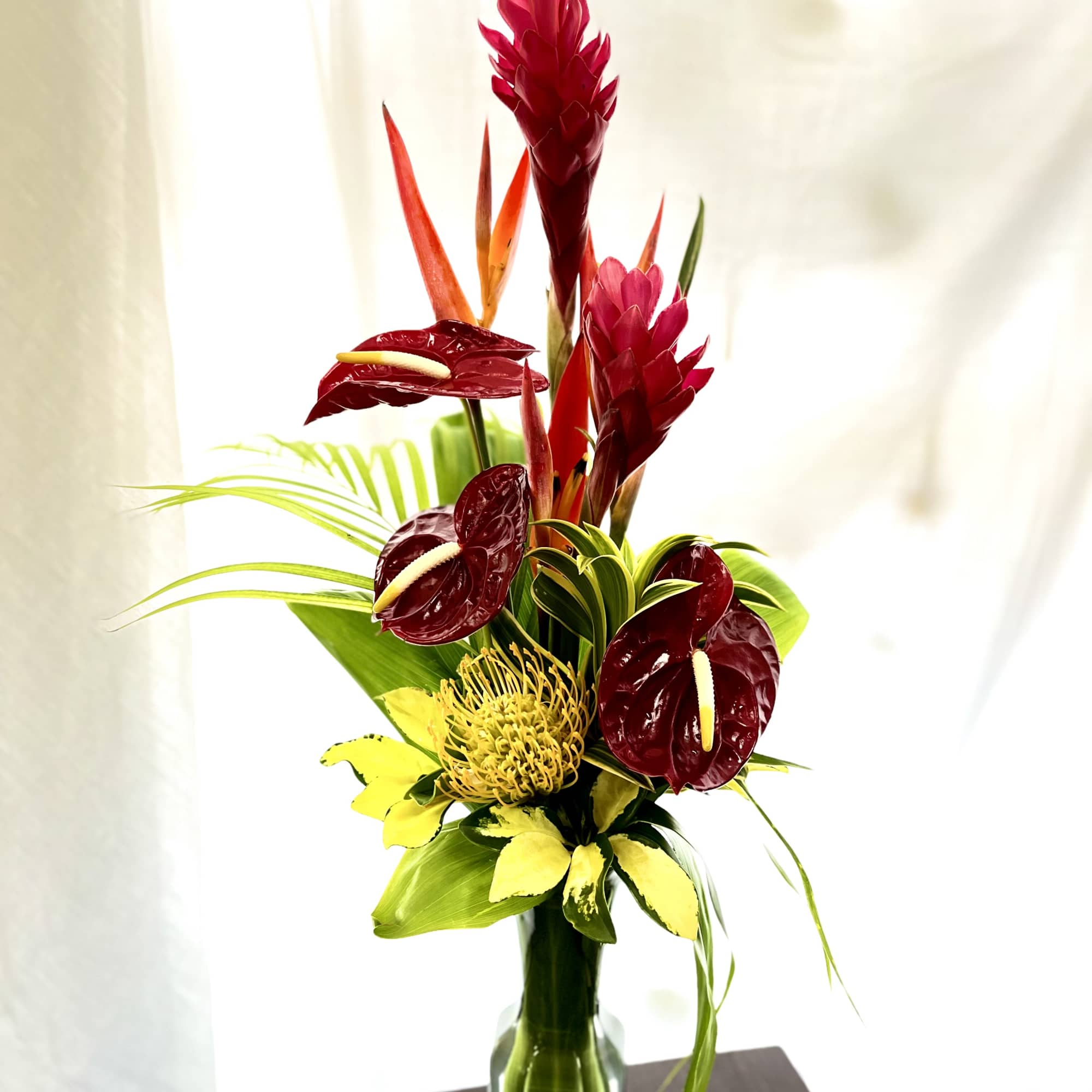 RED or PINK GINGER, CITZ, ANTHURIUM, PROTEA &amp; GREENS

Flowers are based on