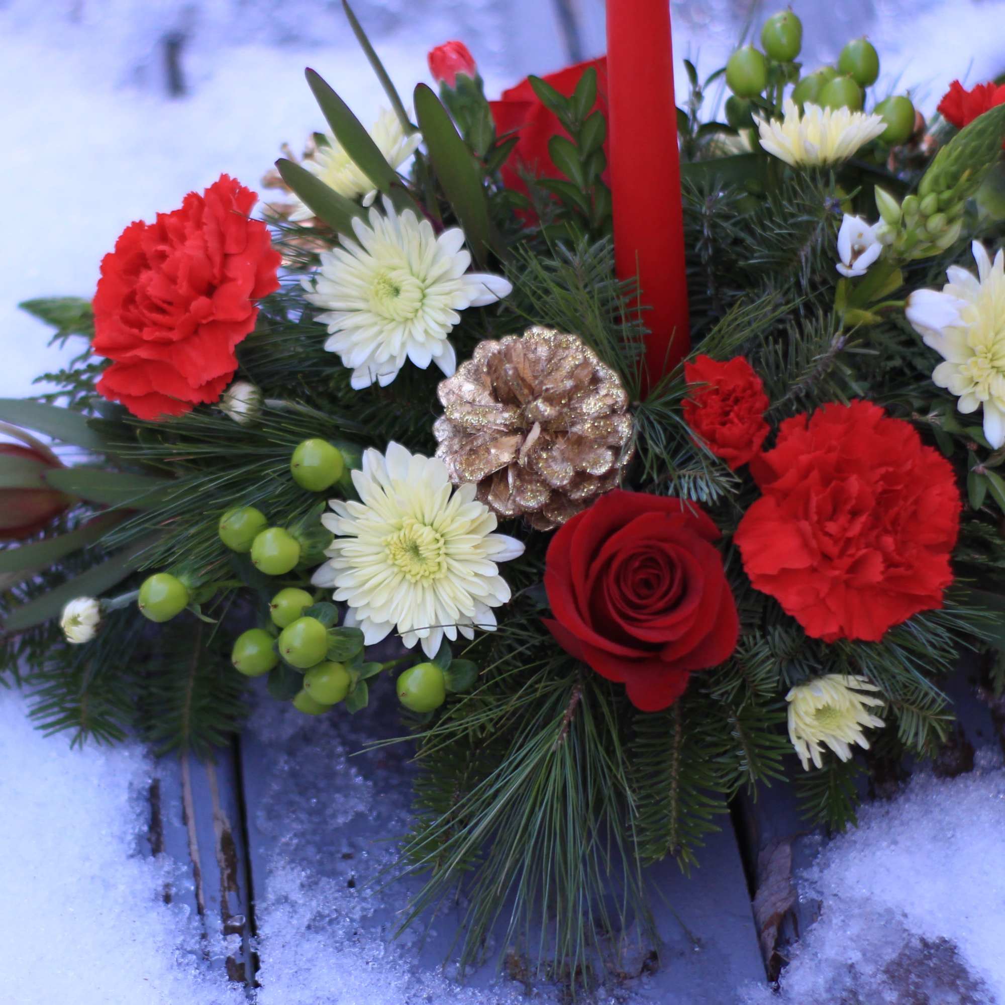 Light up your holidays with a single candle centerpiece created by Lucille