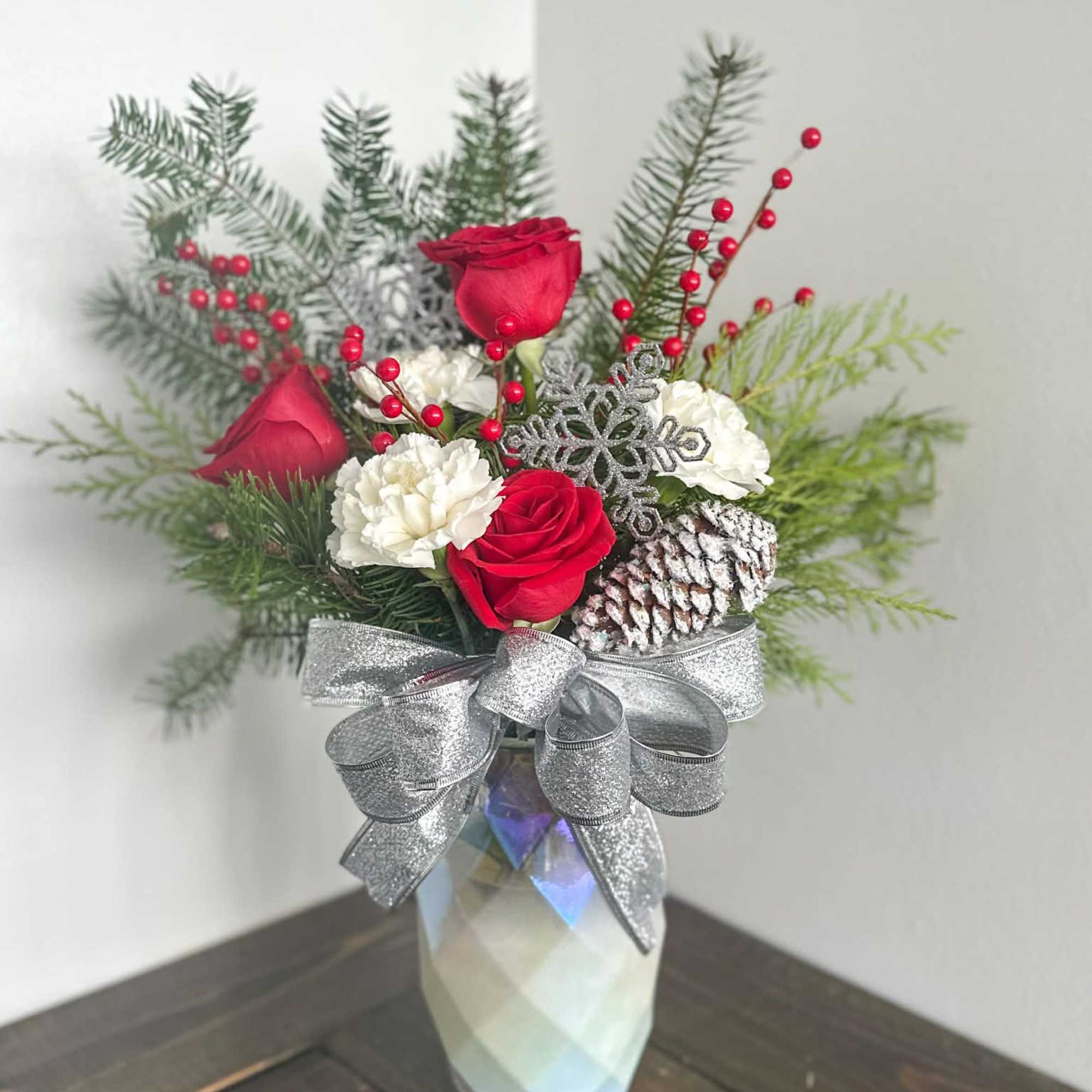 This is a statement piece! Its full of fresh Christmas greens and