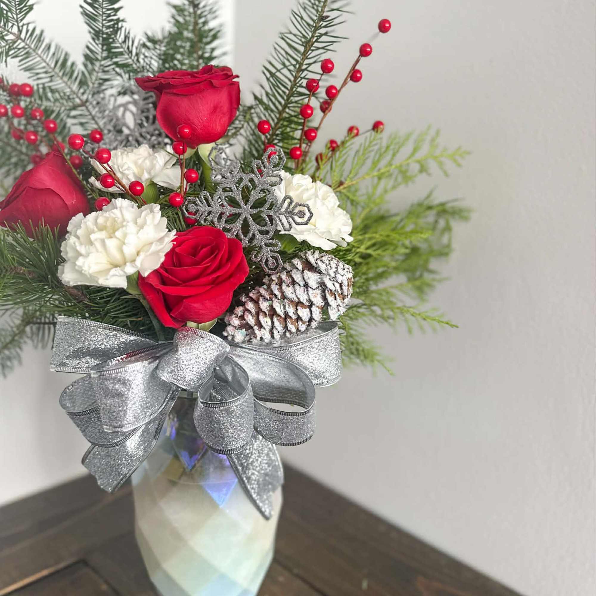 This is a statement piece! Its full of fresh Christmas greens and