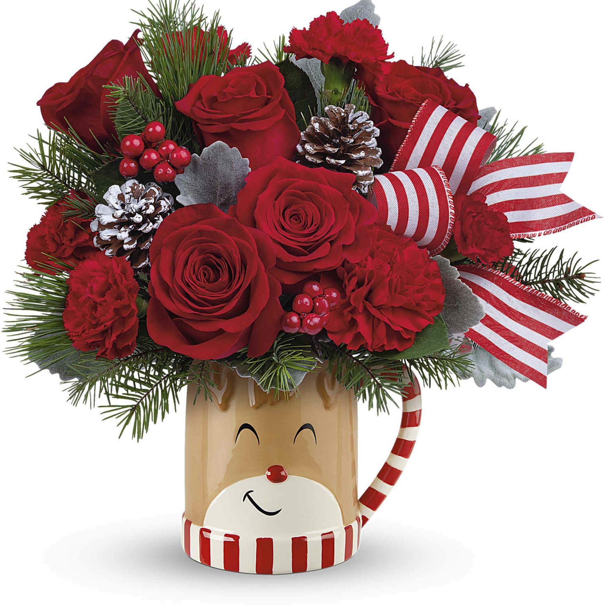 Overflowing with festive blooms, this adorable reindeer delivers your holiday wishes! The