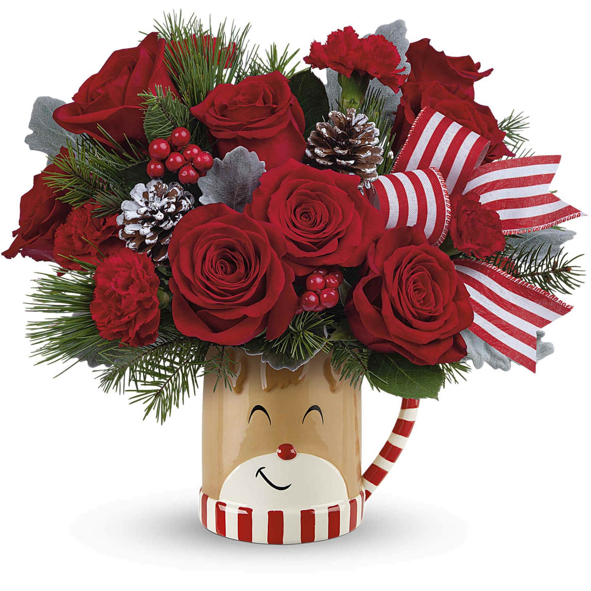 Overflowing with festive blooms, this adorable reindeer delivers your holiday wishes! The