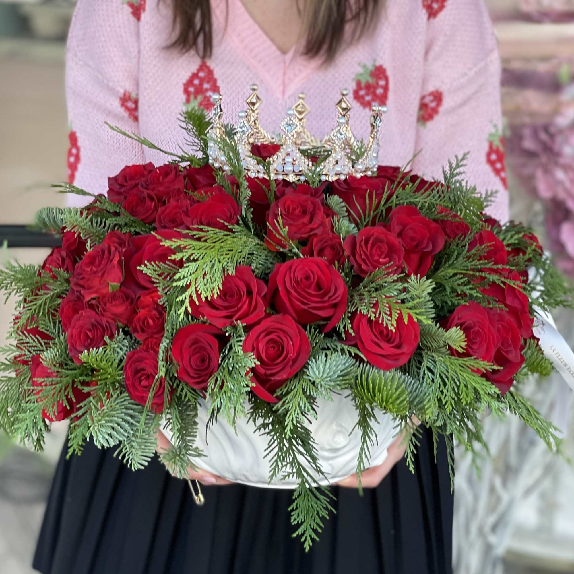 Beautiful Christmas Vase with red roses, topped with a lovely crown. 