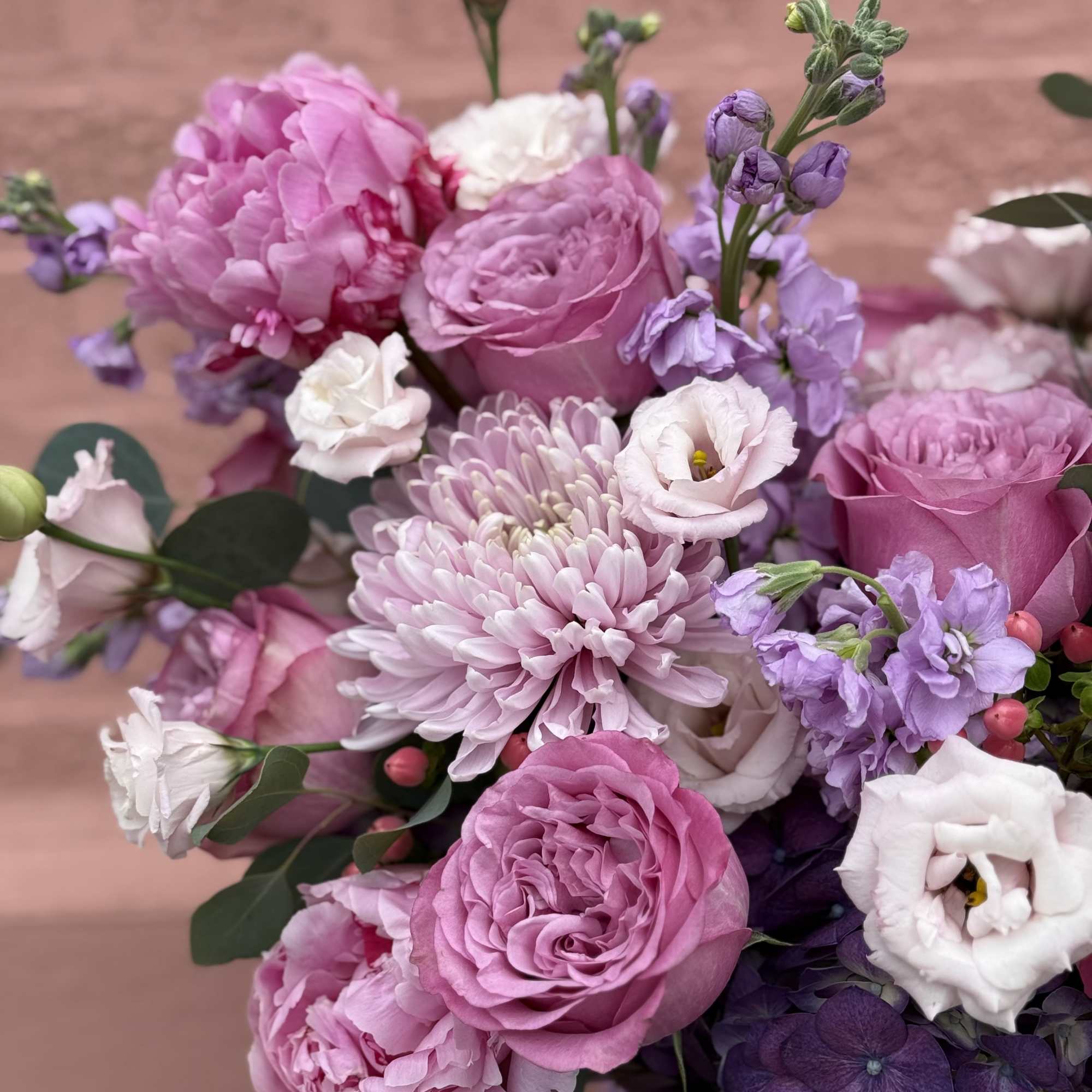 Double-sided arrangement in a box.

The color scheme of the arrangement is lavender