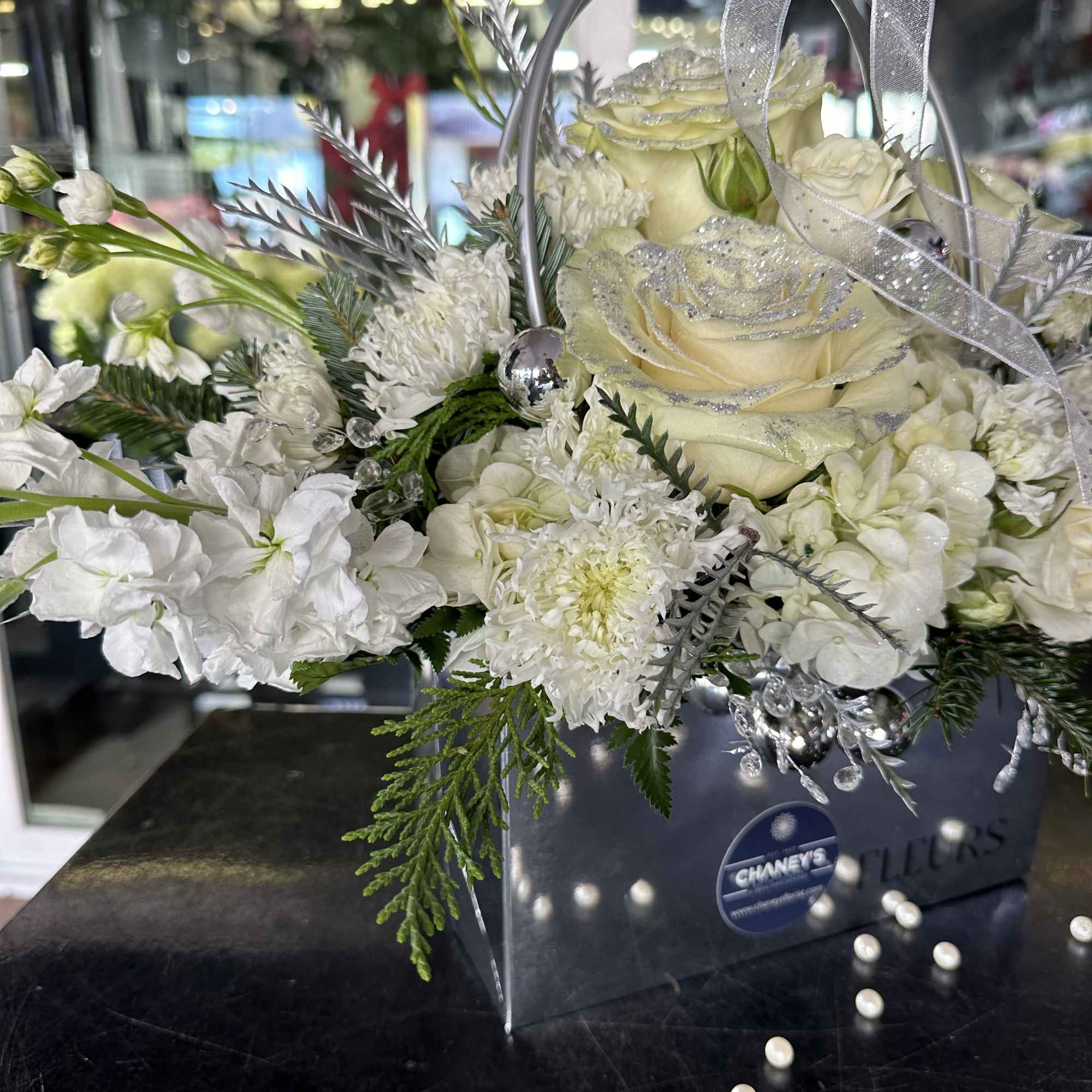 Stunning floral design purse. All silver and white. Classy gift for many