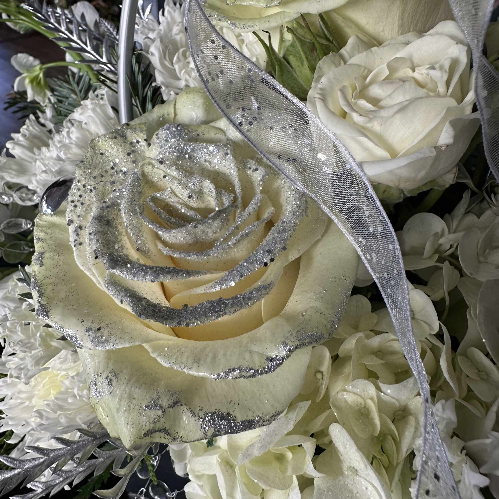 Stunning floral design purse. All silver and white. Classy gift for many