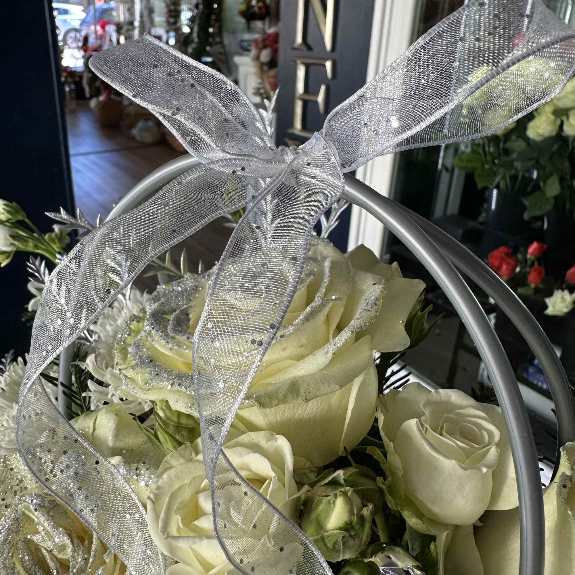 Stunning floral design purse. All silver and white. Classy gift for many