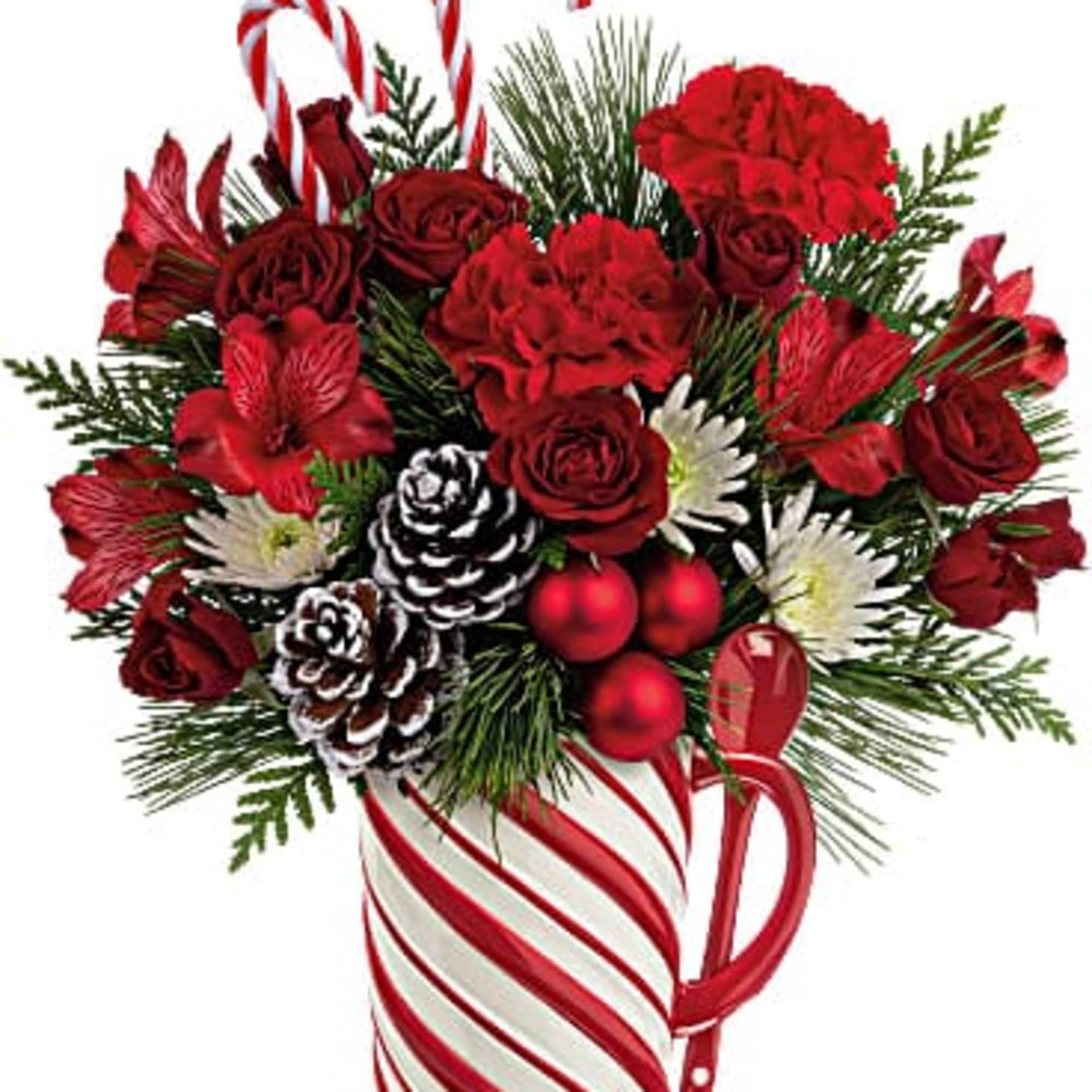 Cozy up to Christmas with this classic holiday bouquet, lovingly arranged in