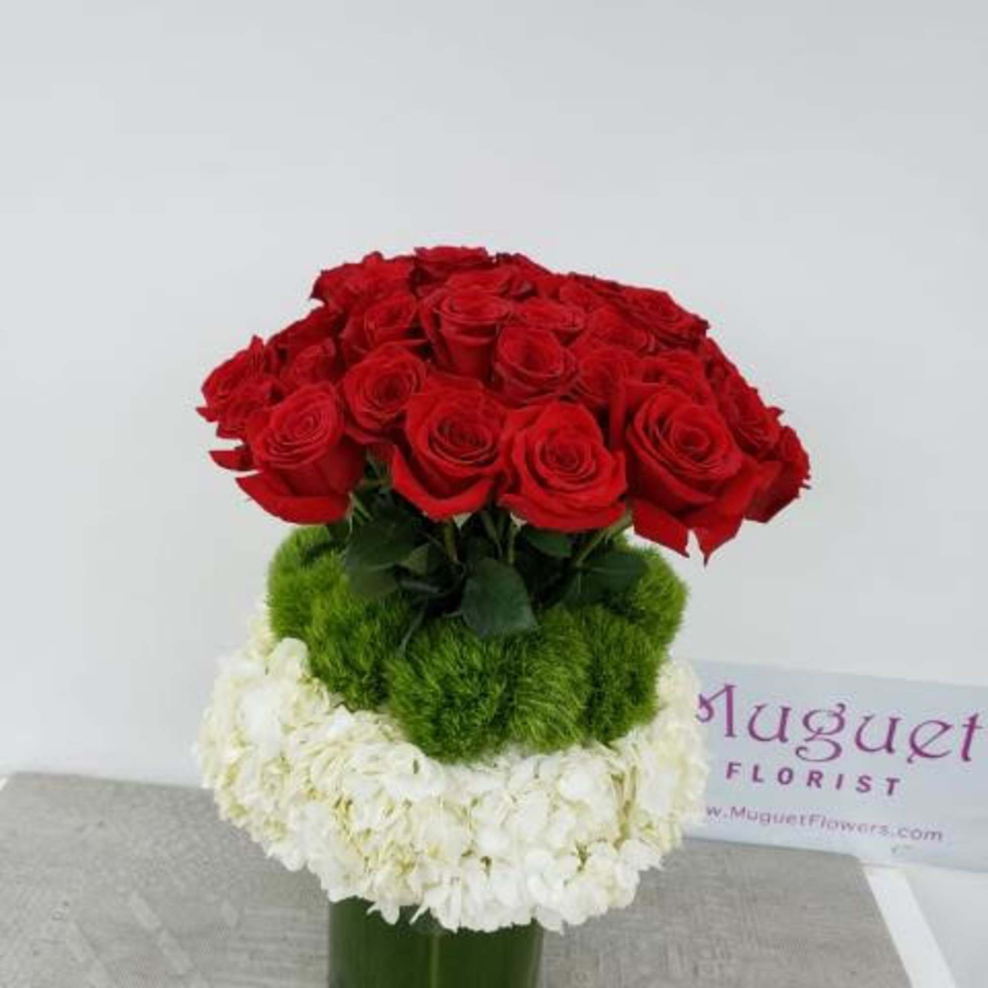 "Lavish Classics" is a timeless floral arrangement that combines the elegance of