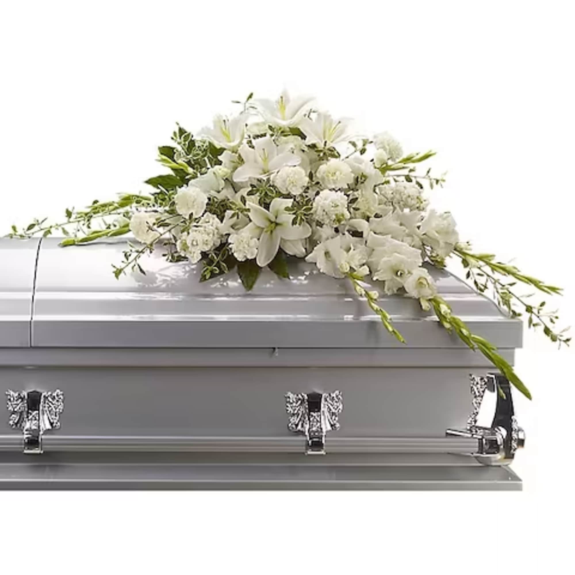 A casket spray made of all white flowers and simple greenery is