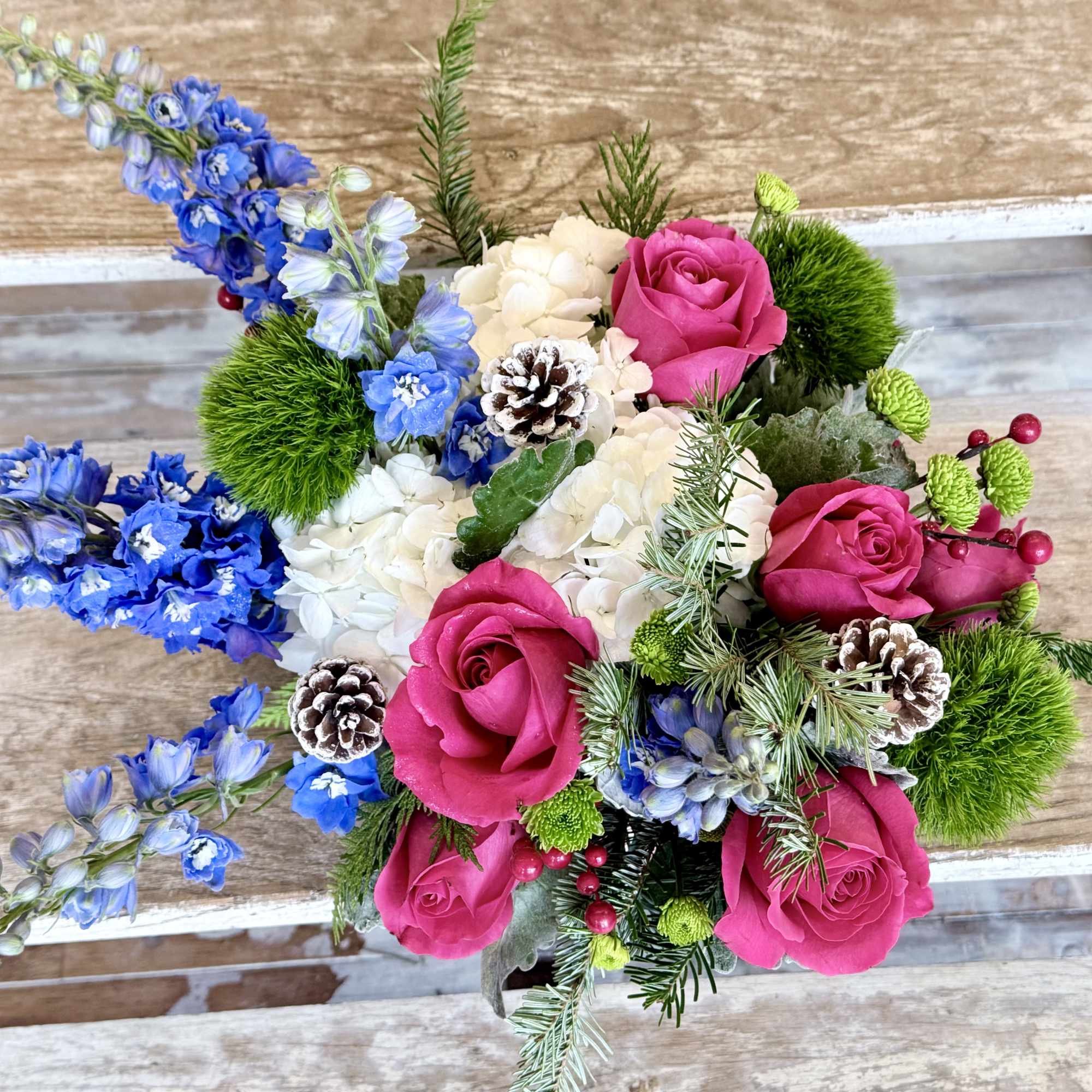 A winter whimsy centerpiece brings festive cheer to your table, counter, or