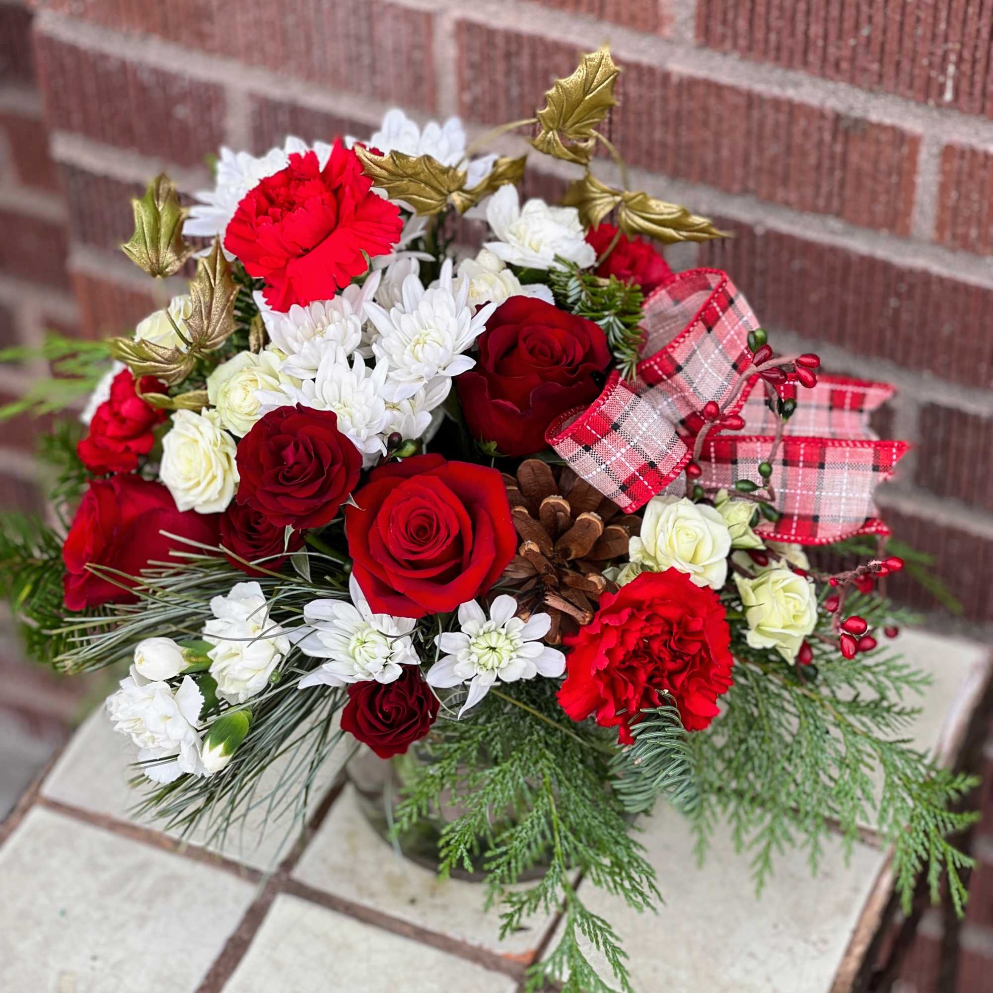 Designed by one of our local gals, this arrangement looks great on