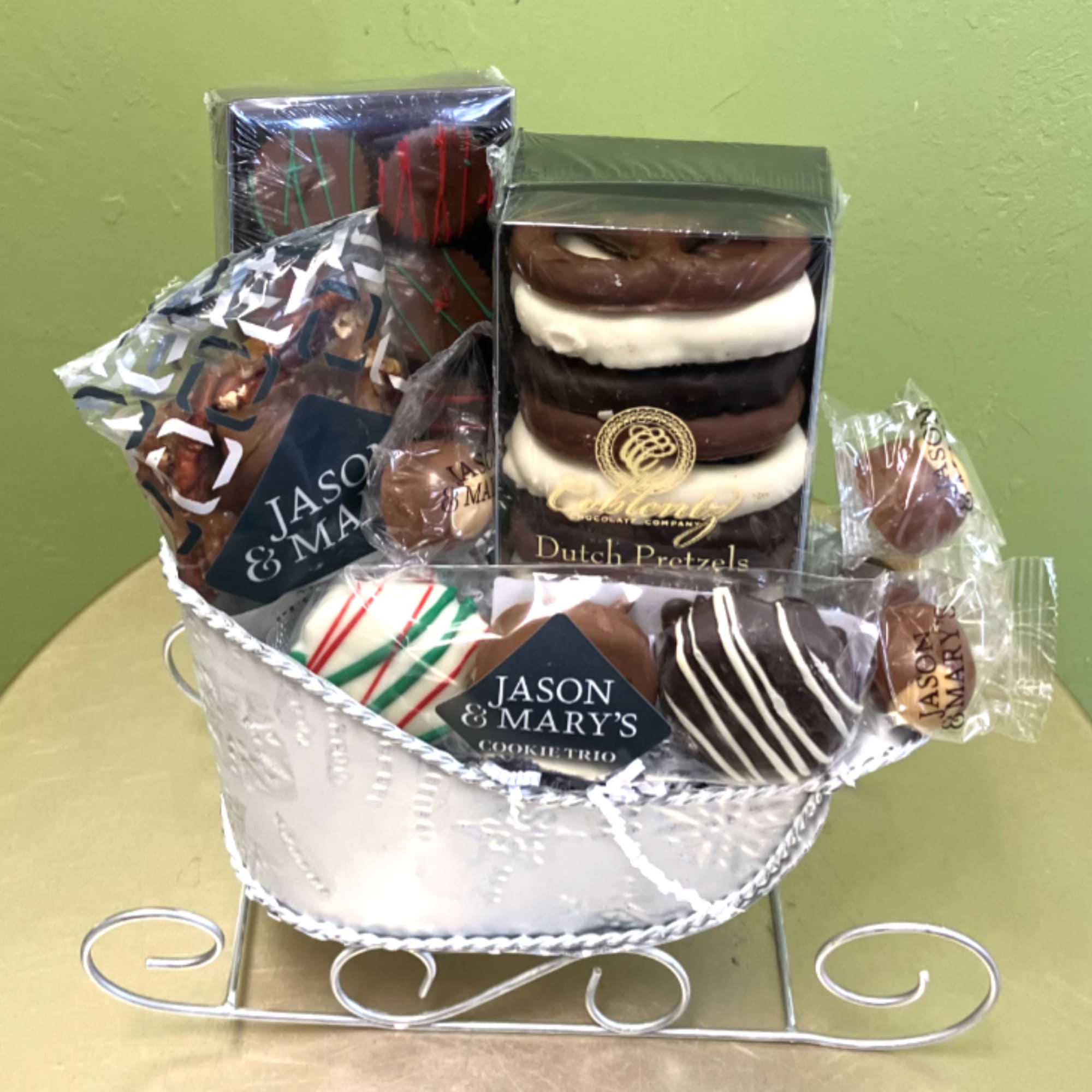 An assortment of delicious hand made chocolates in a rustic white and