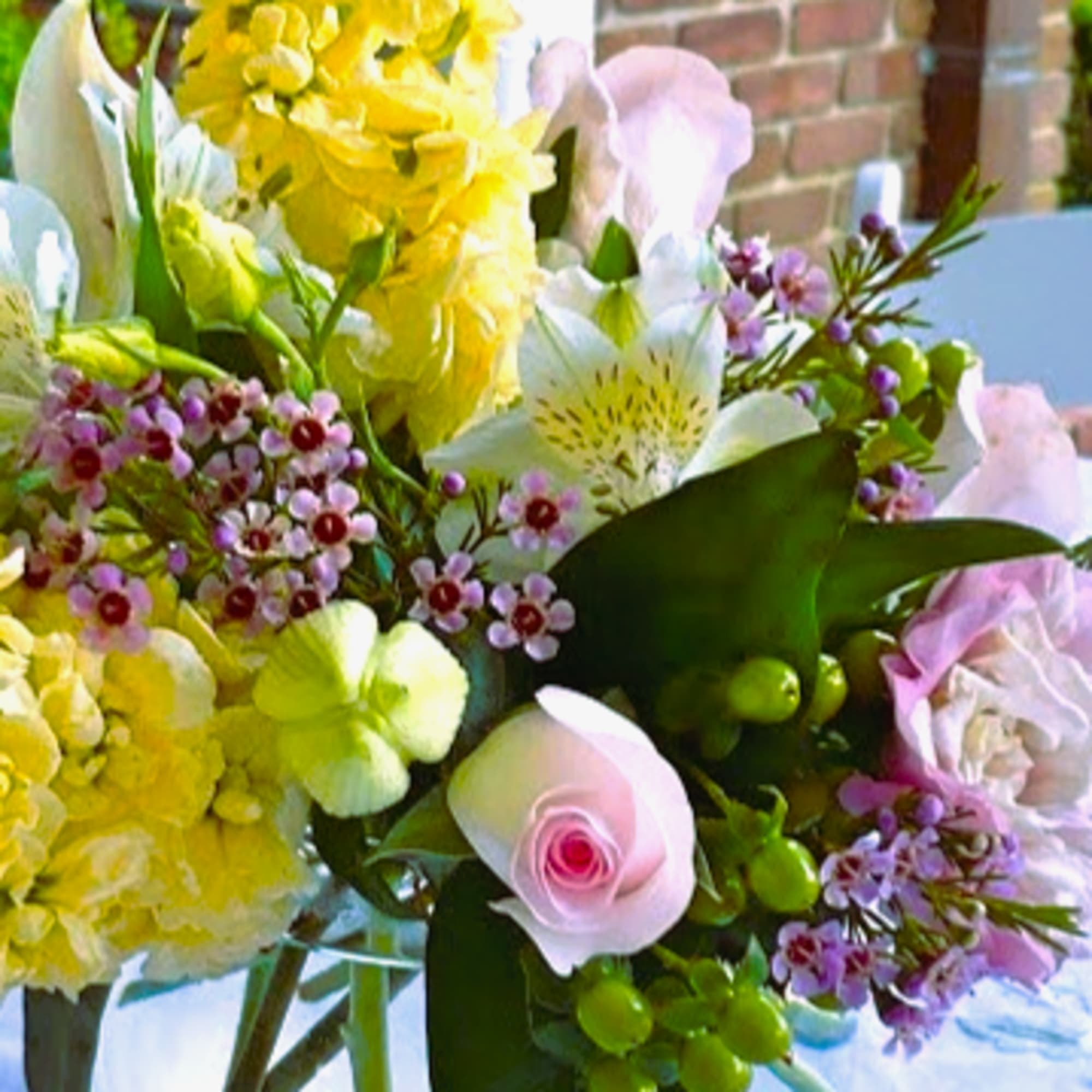 A Charming Token of Joy
Our Simply Sweet arrangement is a delightful medley