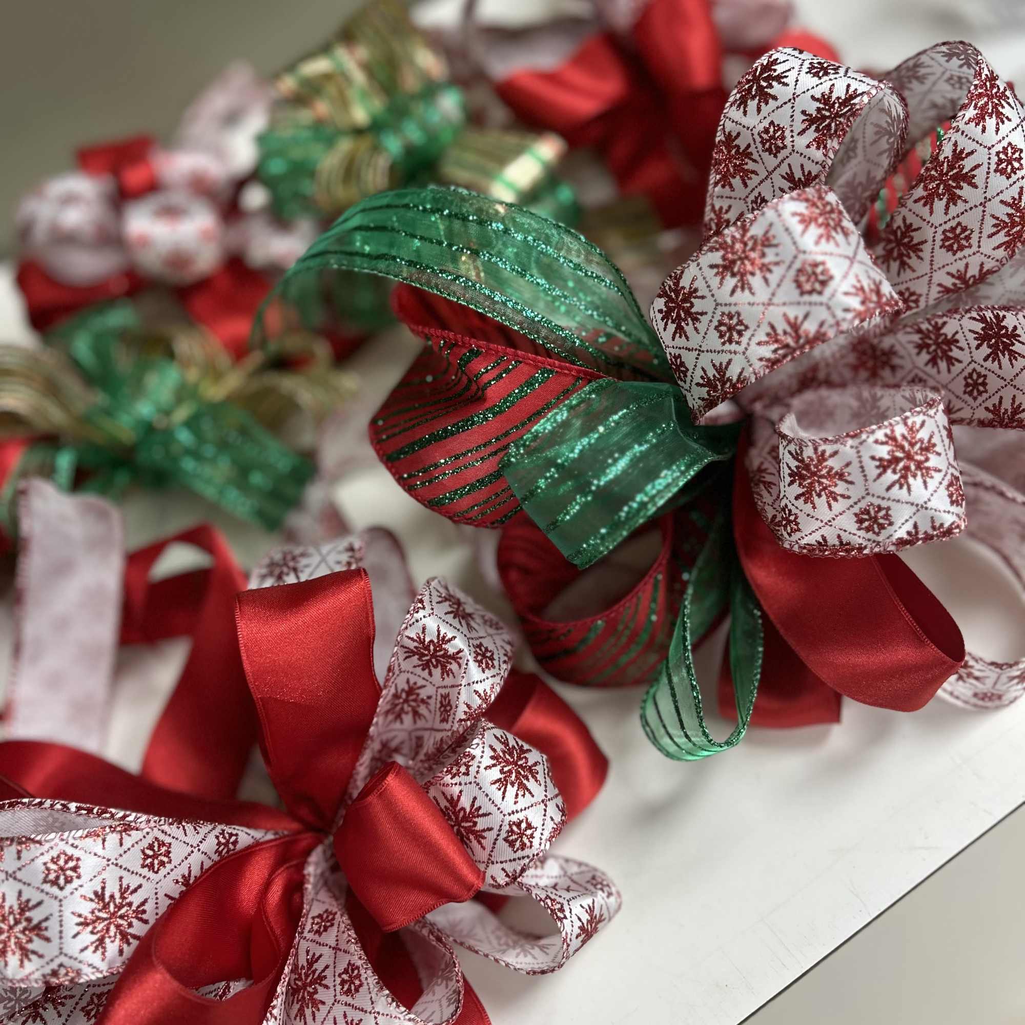Beautiful selection of bows and ribbons for your holiday decorating. 