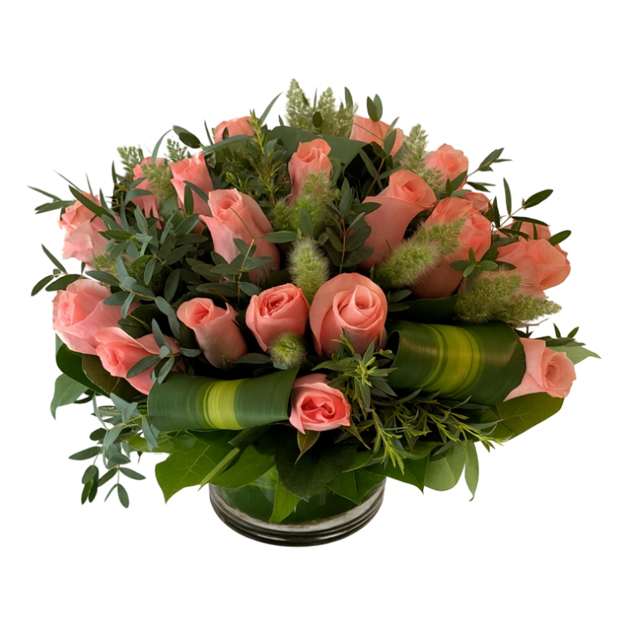 Delicate pink roses nestled in soft greenery, creating a serene arrangement that