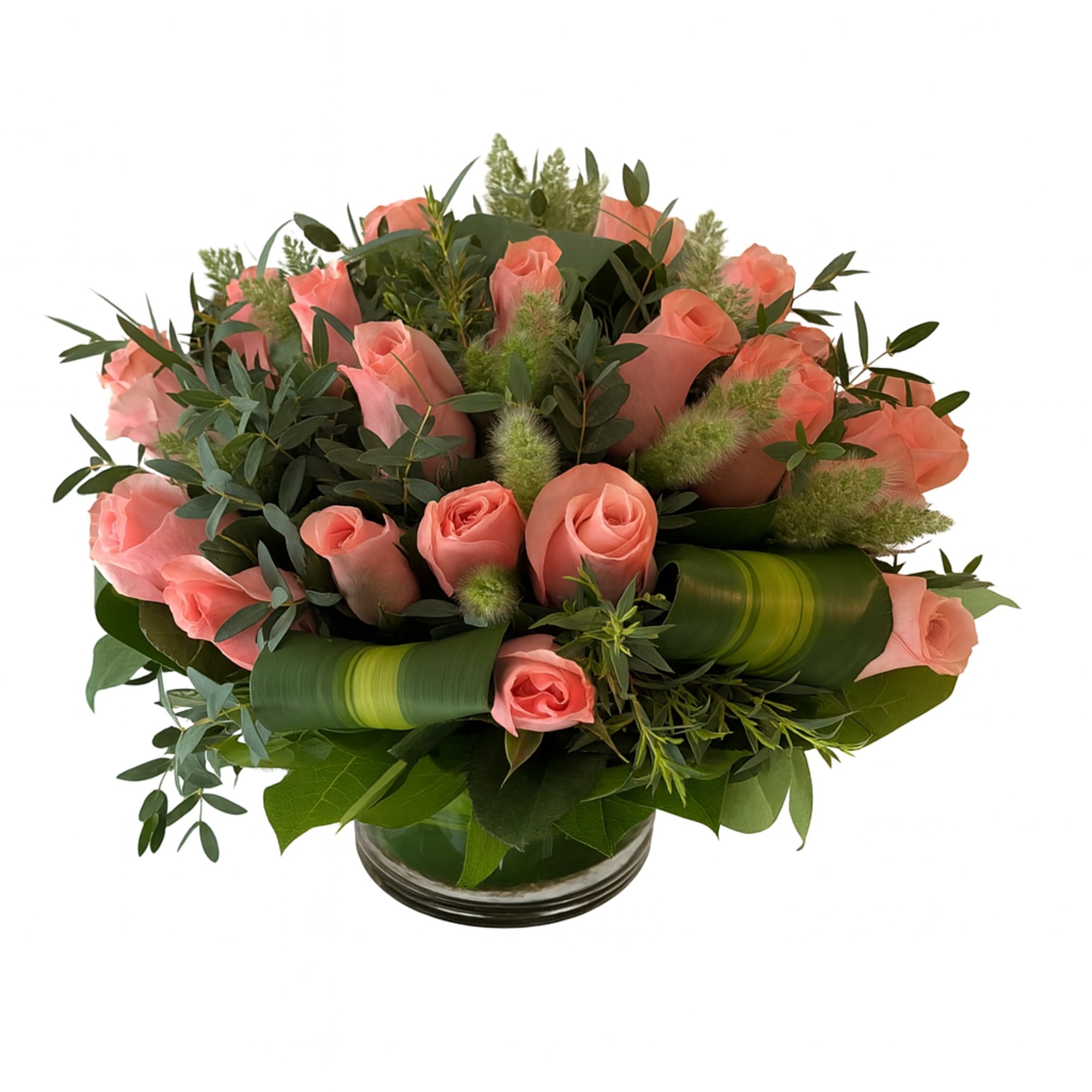 Delicate pink roses nestled in soft greenery, creating a serene arrangement that