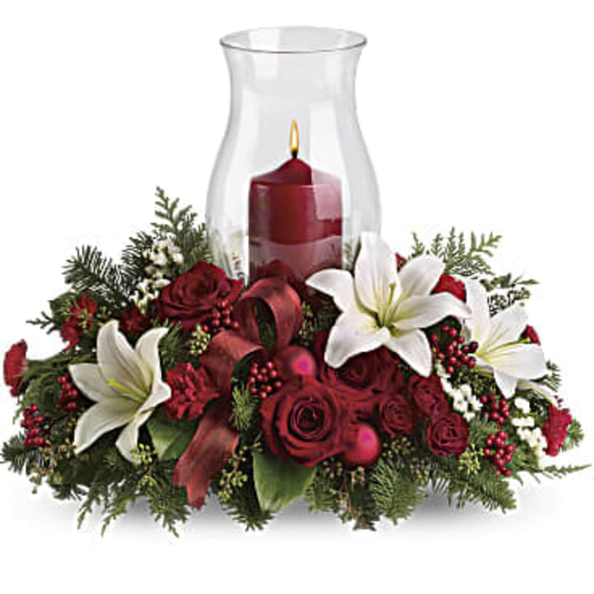  This beautiful Christmas centerpiece with its classic glass hurricane and red
