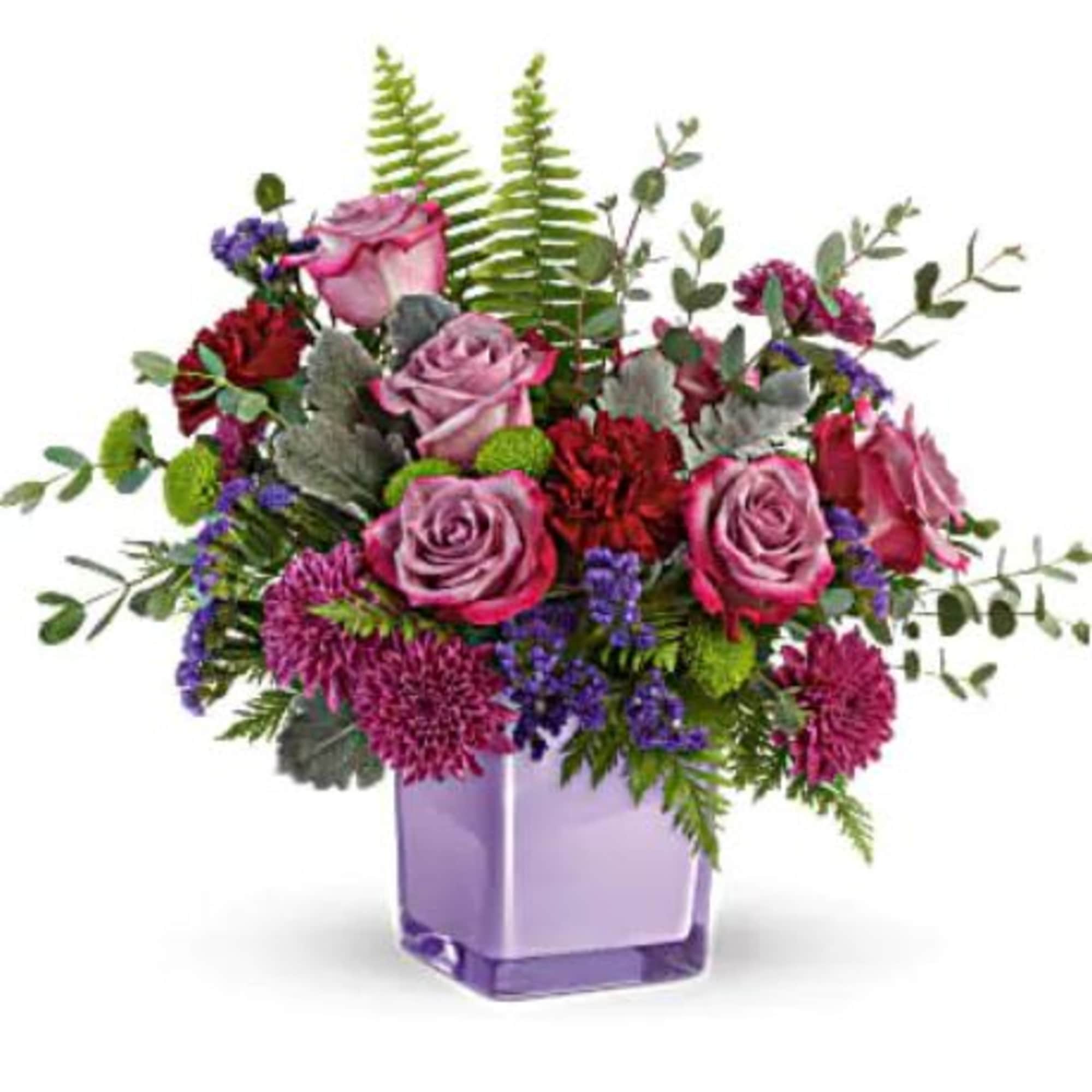 Lavender roses, maroon carnations, purple cushion spray chrysanthemums, green button spray chrysanthemums
