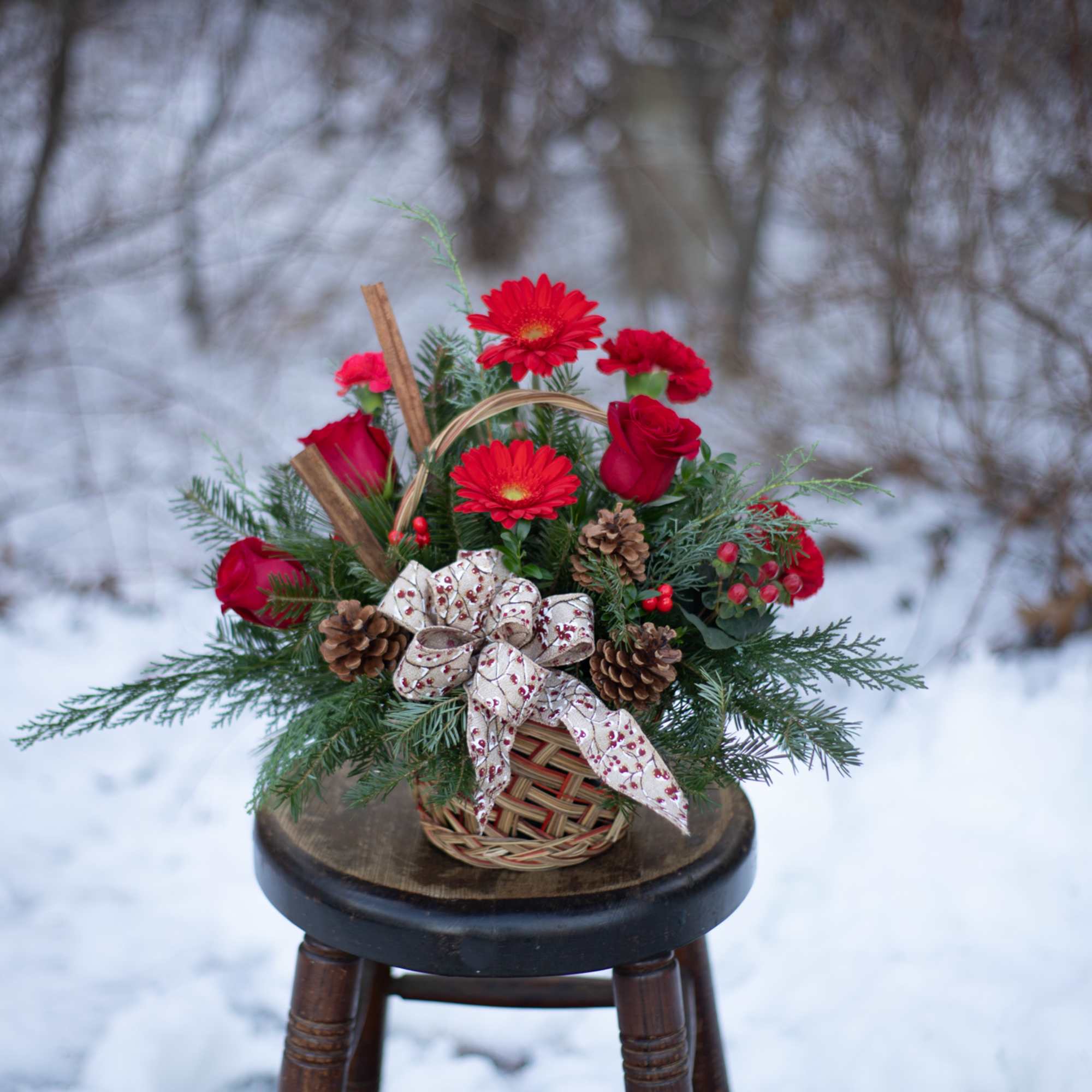 Berries and spice and everything nice make this arrangement a wonderful holiday