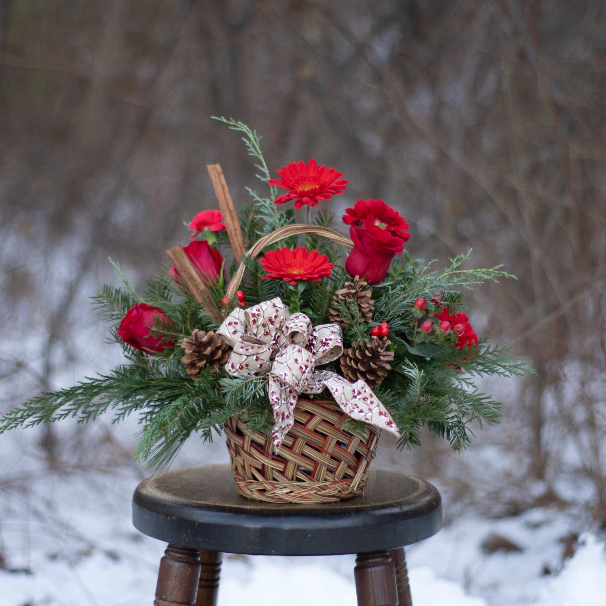 Berries and spice and everything nice make this arrangement a wonderful holiday