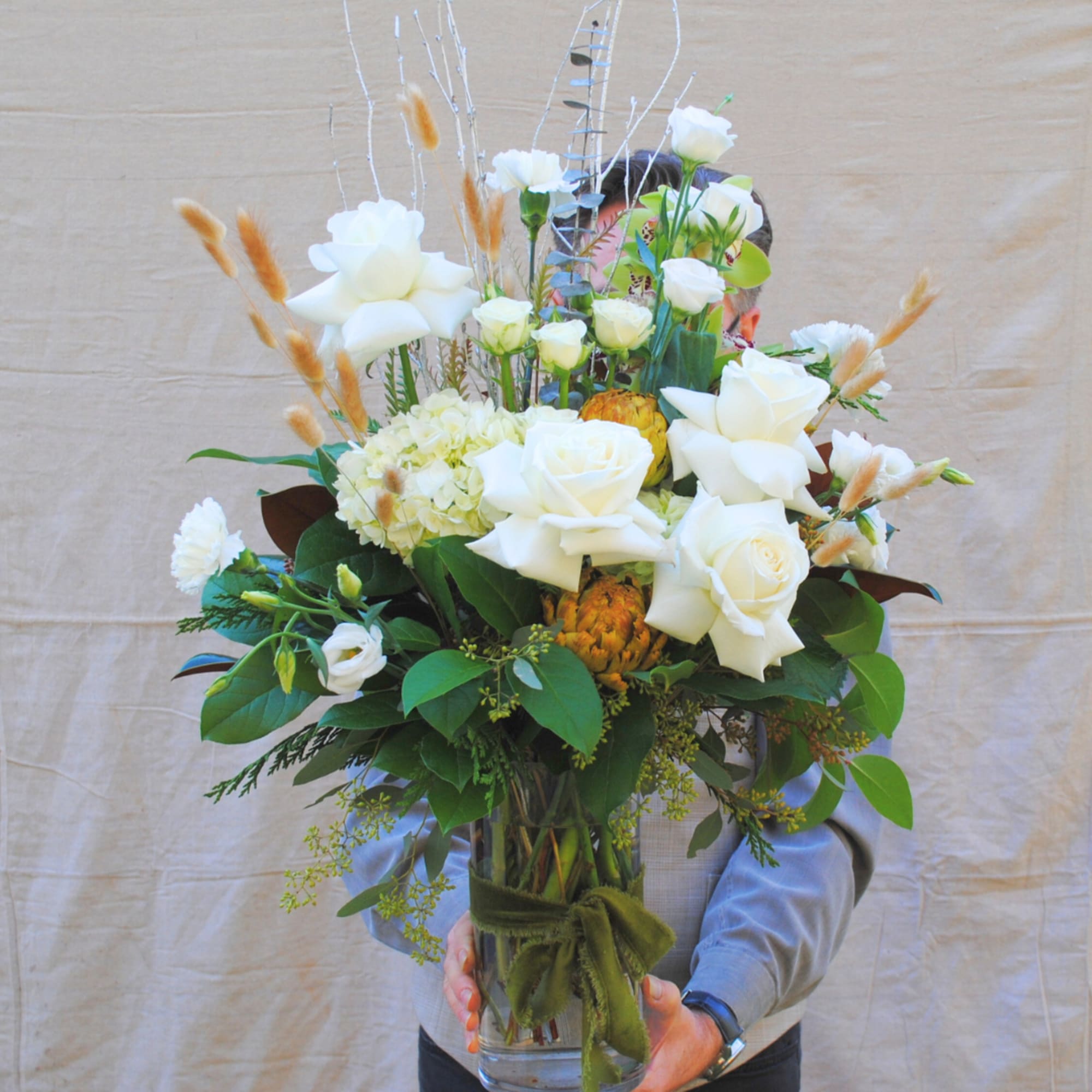 Silent Night is a tall, impactful modern arrangement artfully designed in a