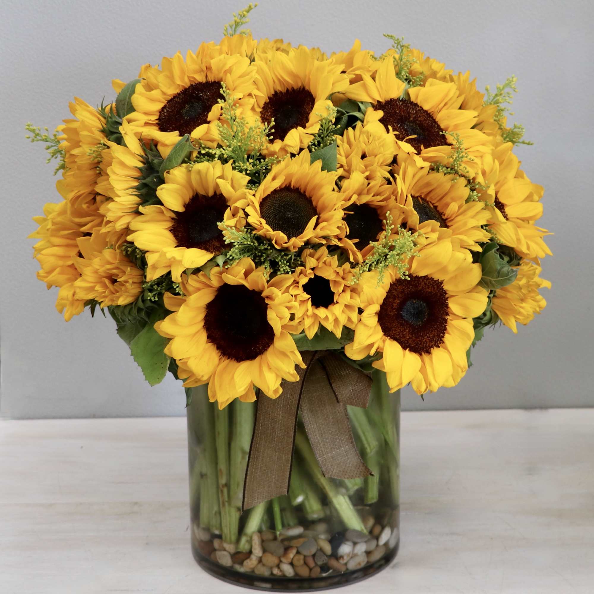 My Glendale Florist presents this arrangement featuring sunflowers.  This lovely gift
