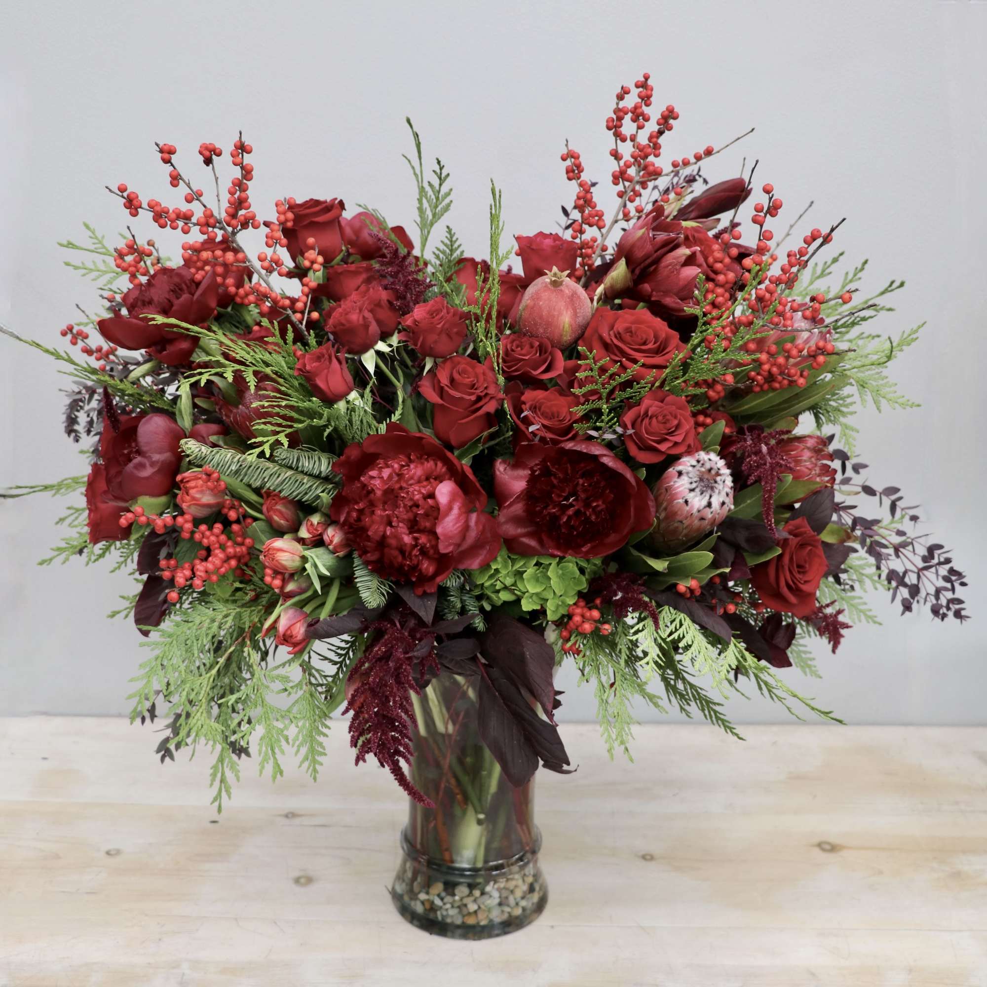 All the holiday greats; Peonies, tulips, and amaryllis. This arrangement is without