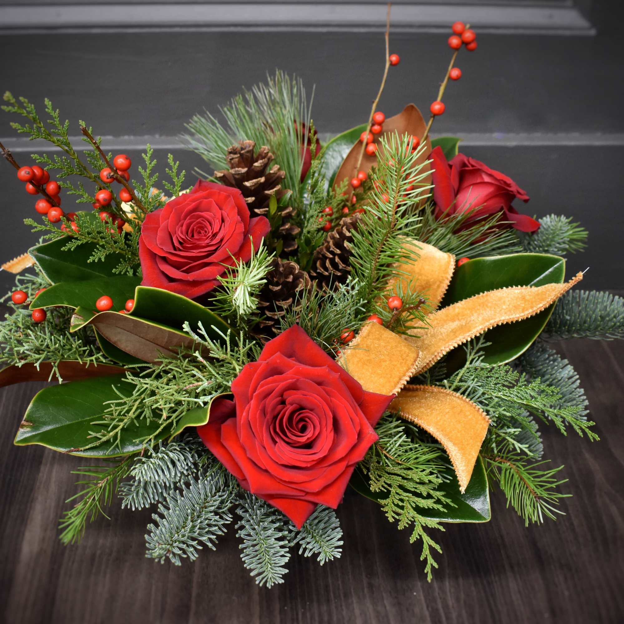 Nothing says classic Christmas like fresh evergreens, pinecones and berries! This charming
